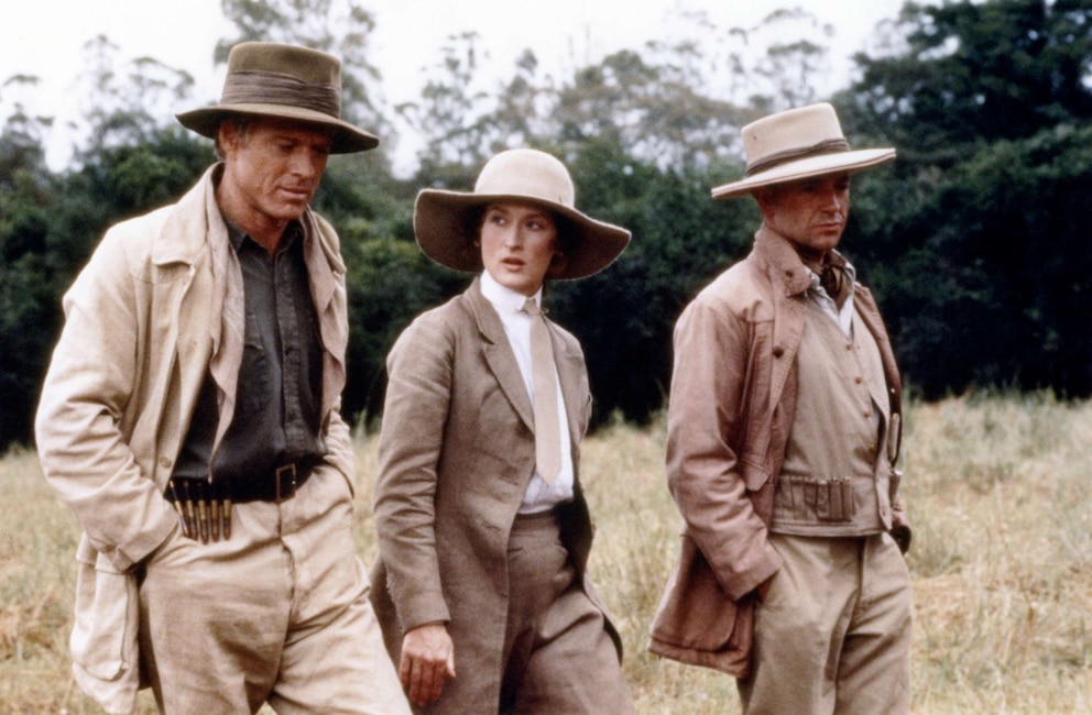 PHOTO: Robert Redford, left as Denys, Meryl Streep, as Karen, and Austrian actor Klaus Maria Brandauer, Bror, on the set of "Out of Africa."