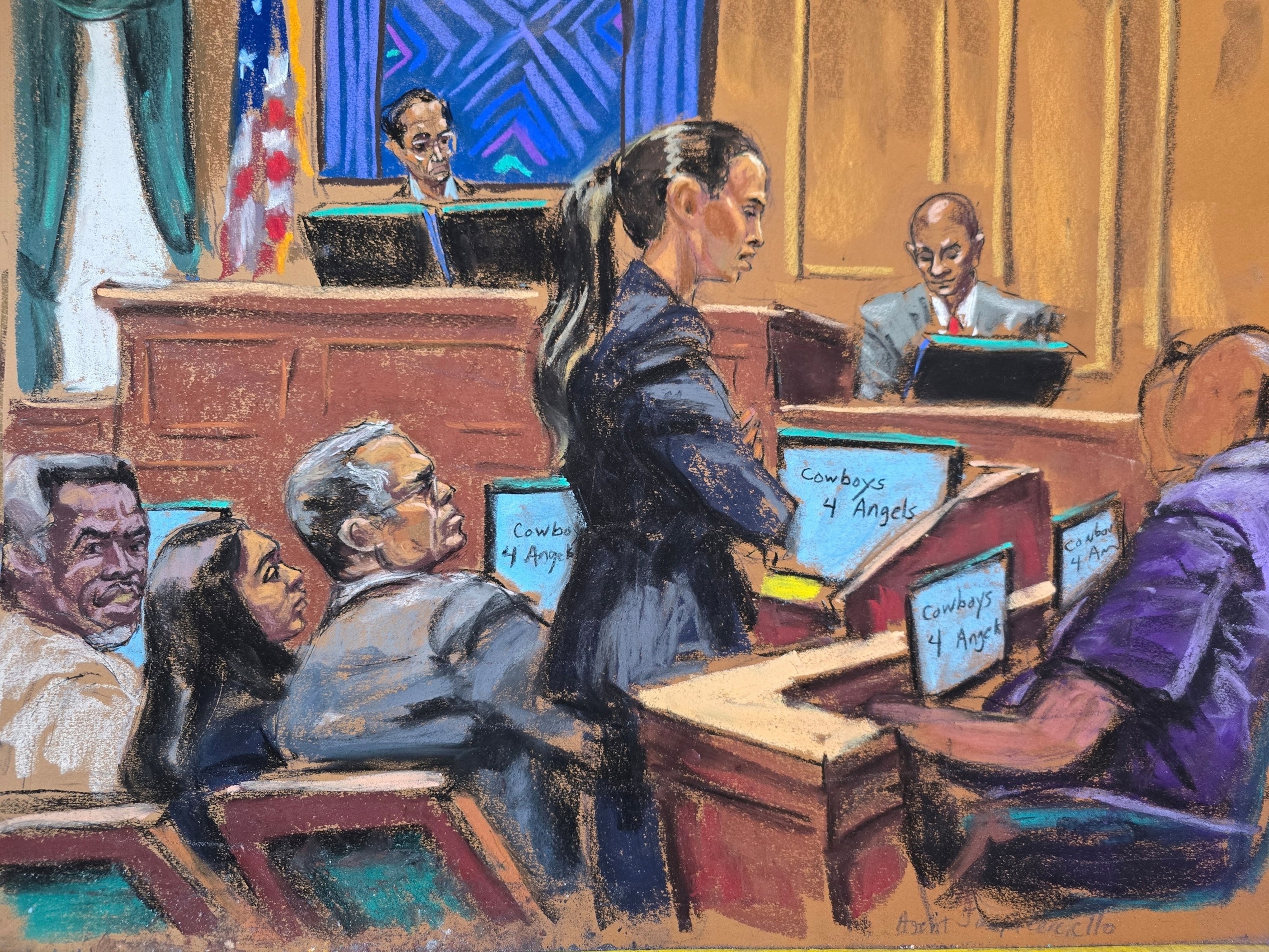 PHOTO: Defense lawyer Teny Geragos cross examines Joseph Cerciello as Sean "Diddy" Combs and his defense lawyers Nicole Westmoreland and Marc Agnifilo watch in New York City, June 23, 2025.