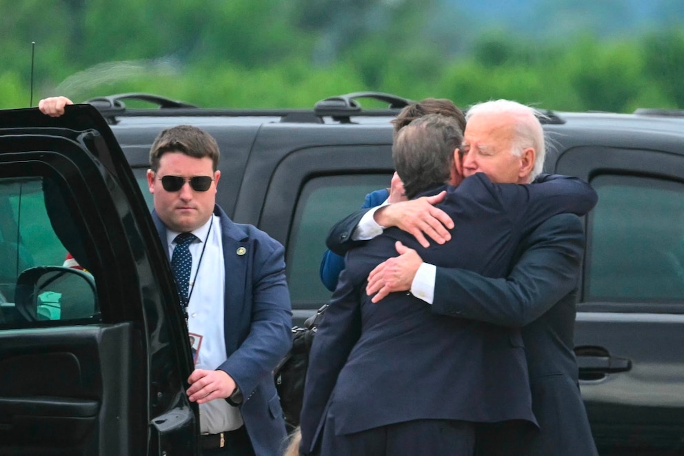 PHOTO: President Joe Biden hugs his son Hunter Biden upon arrival at Delaware Air National Guard Base in New Castle, Del., on June 11, 2024, as he travels to Wilmington, Del.