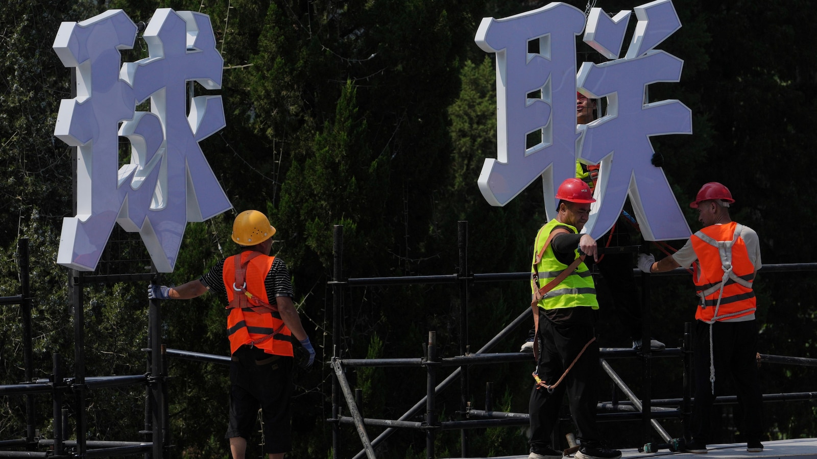 China's economy lags in July under pressure from tariffs and a weak property market