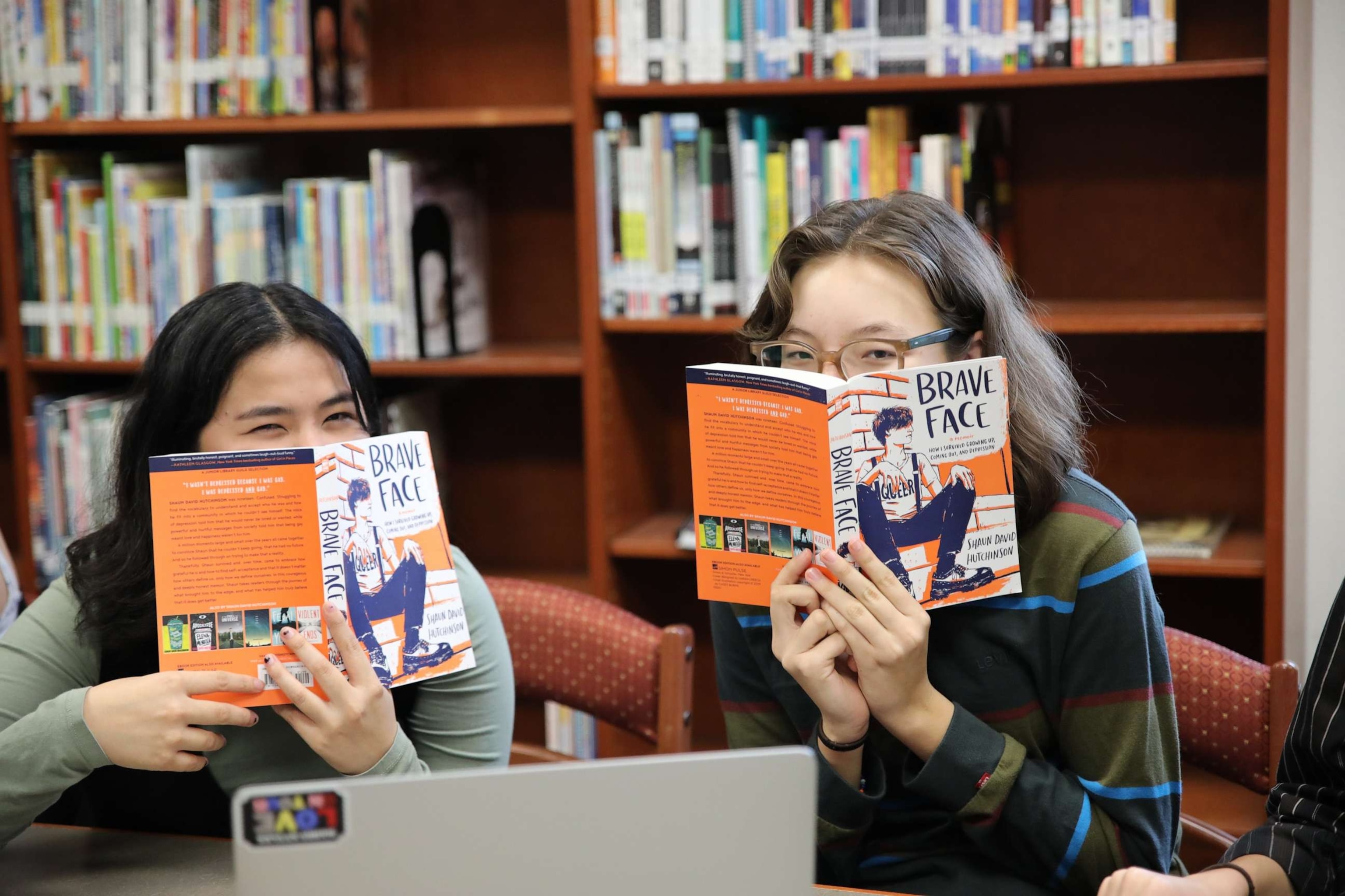 student studying books