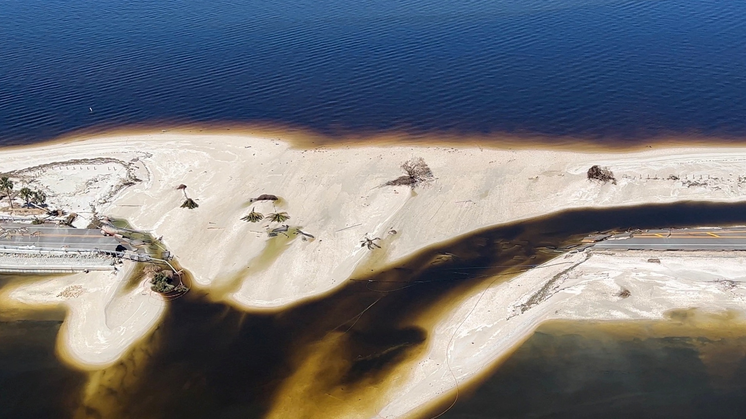 PHOTO: A destroyed portion of the causeway from Fort Myers to Sanibel Island is seen in this frame grab from video after Hurricane Ian caused widespread destruction on Sanibel Island, Fla., Oct. 1, 2022.