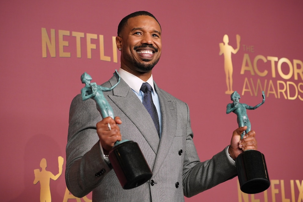 PHOTO: Michael B. Jordan poses with the awards for outstanding performance by a male actor in a leading role and outstanding performance by a cast in a motion picture for "Sinners" during the 32nd Annual Actor Awards, March 1, 2026, in Los Angeles.