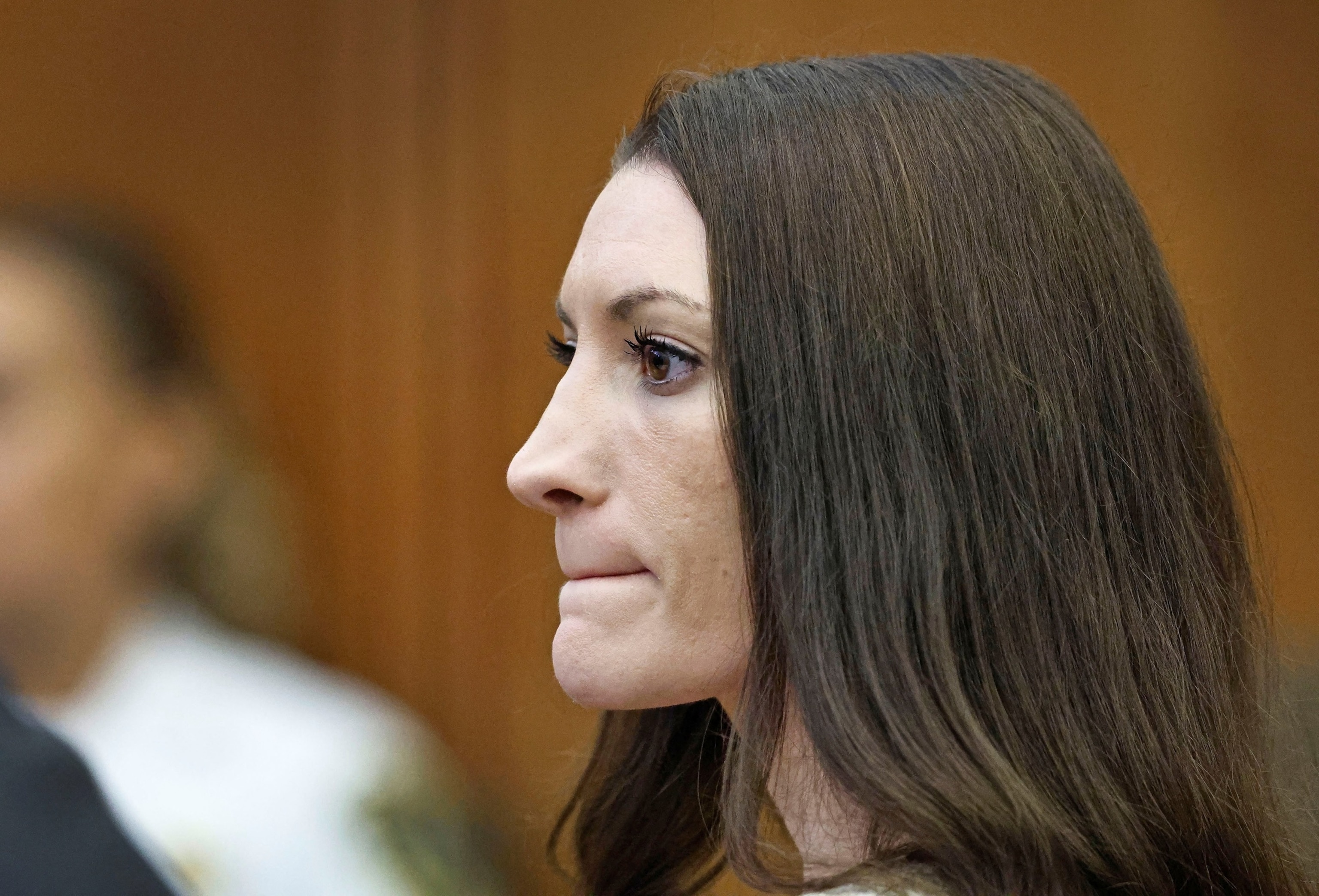 PHOTO: Lyndsay Clancy listens to the testimony of Dr. Gregory Saathoff  during her murder trial in Plymouth Superior Court, Aug. 26, 2026 in Plymouth, Mass. 