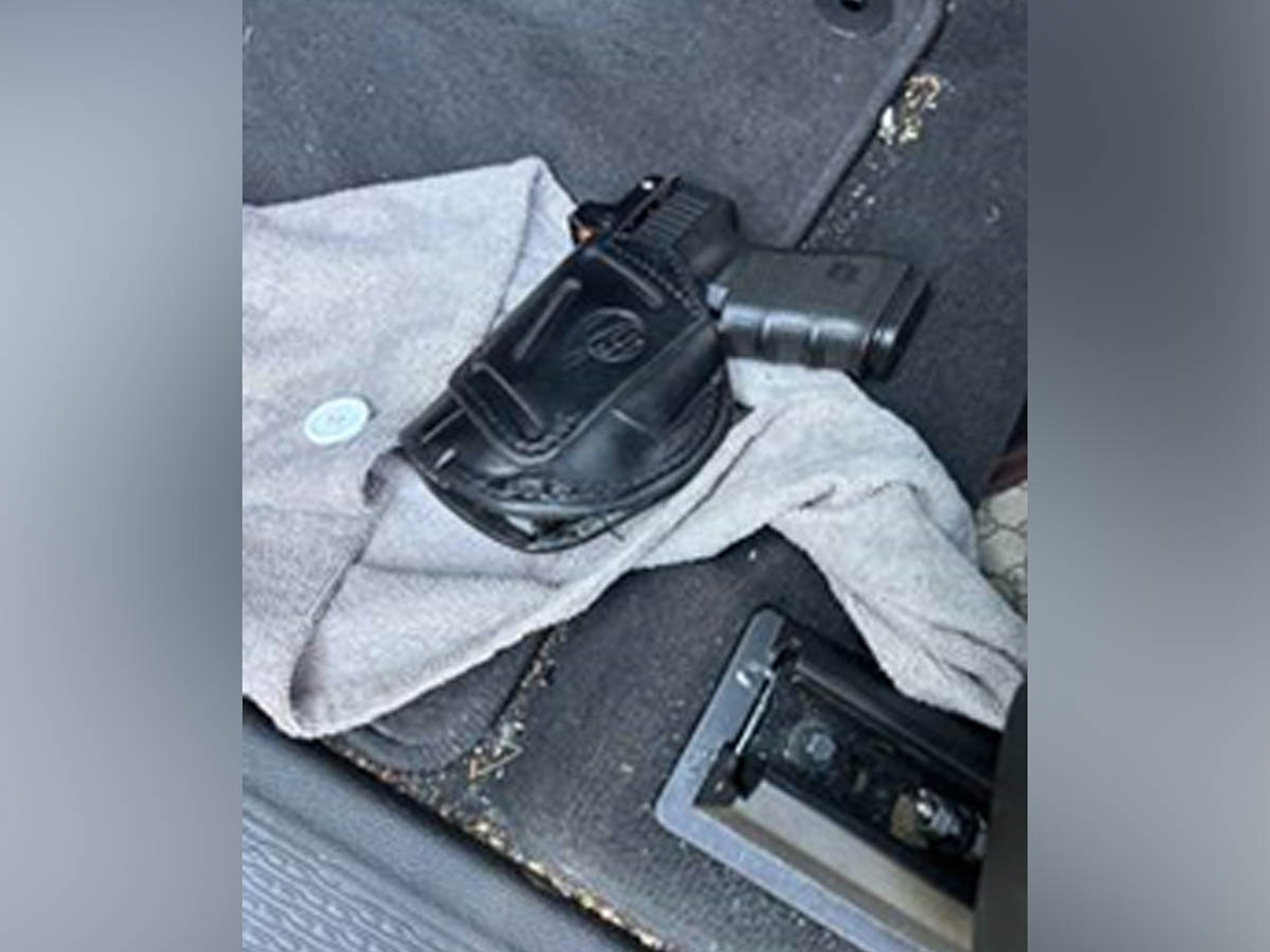 A photo of what ICE reported as a loaded handgun found in Ian Robert's vehicle, Sept. 26, 2025. ICE