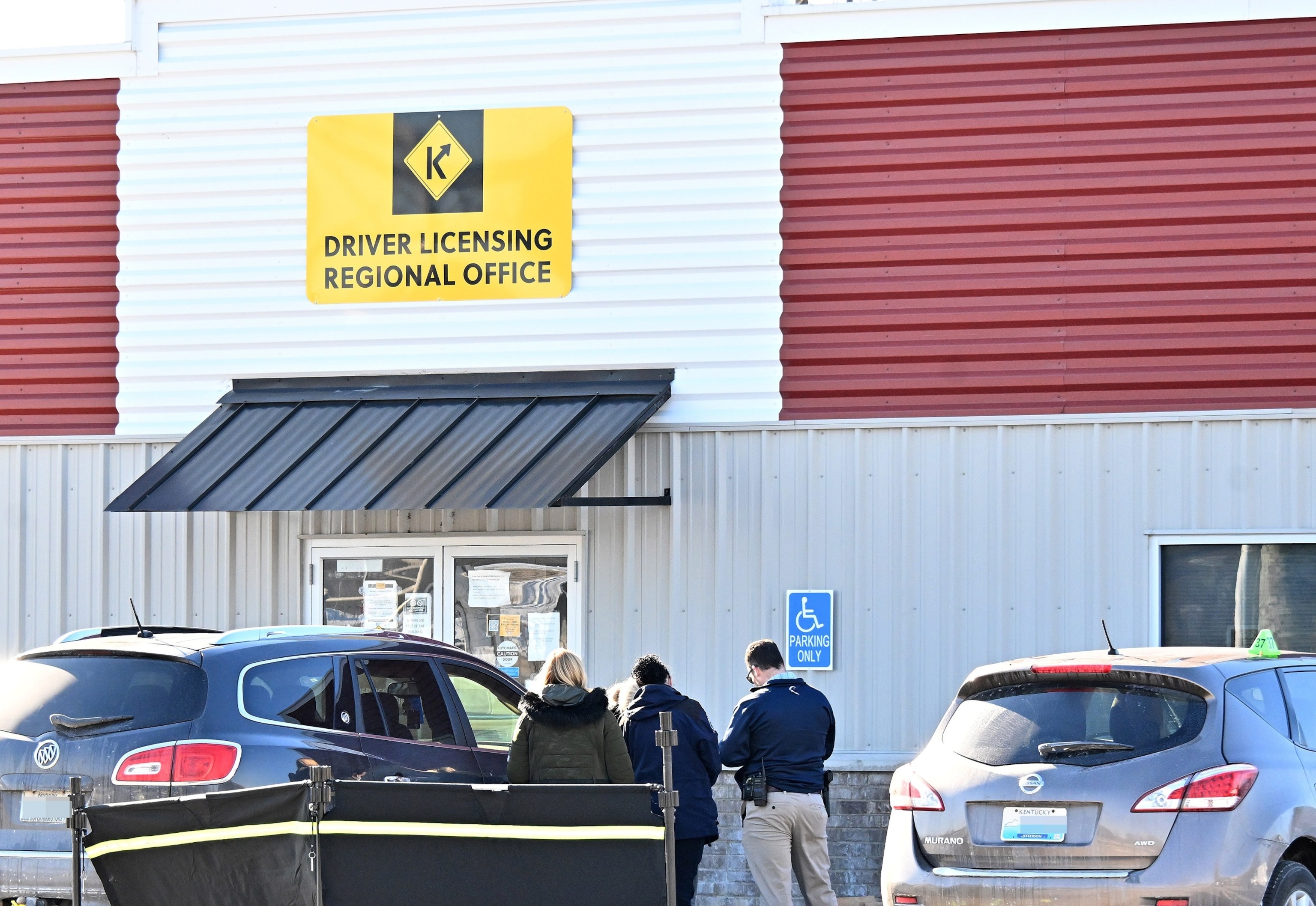 PHOTO: In this Feb. 21, 2025, file photo, Louisville Metro Police Department processes the crime scene at the Fairdale Kentucky branch DMV in Louisville, Kentucky.