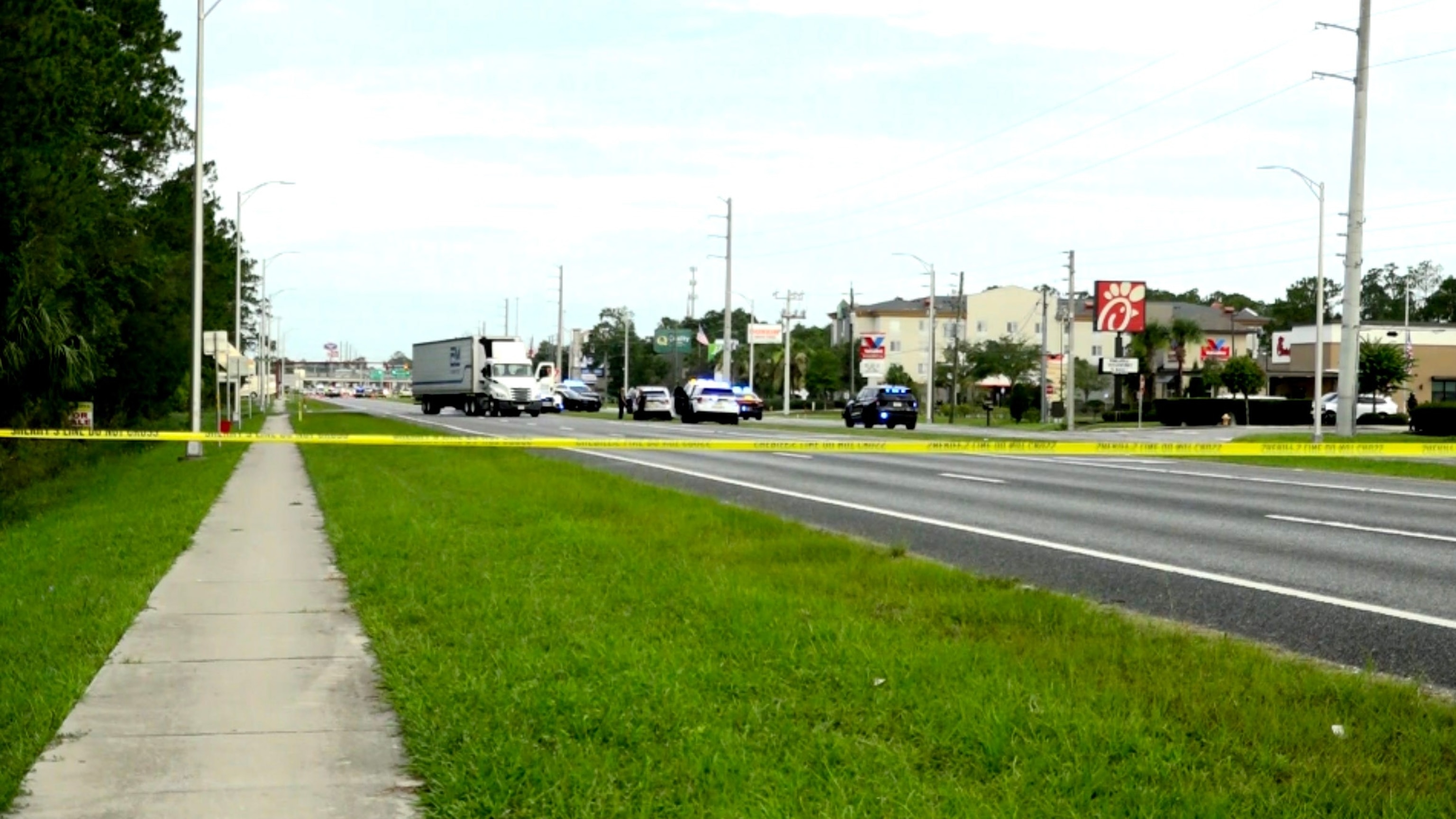 PHOTO: In this screen grab from a video, law enforcement vehicles are shown at the scene where a man died after he ran from Immigration and Customs Enforcement (ICE) officers in St. Augustine, Fla., on July 14, 2026.