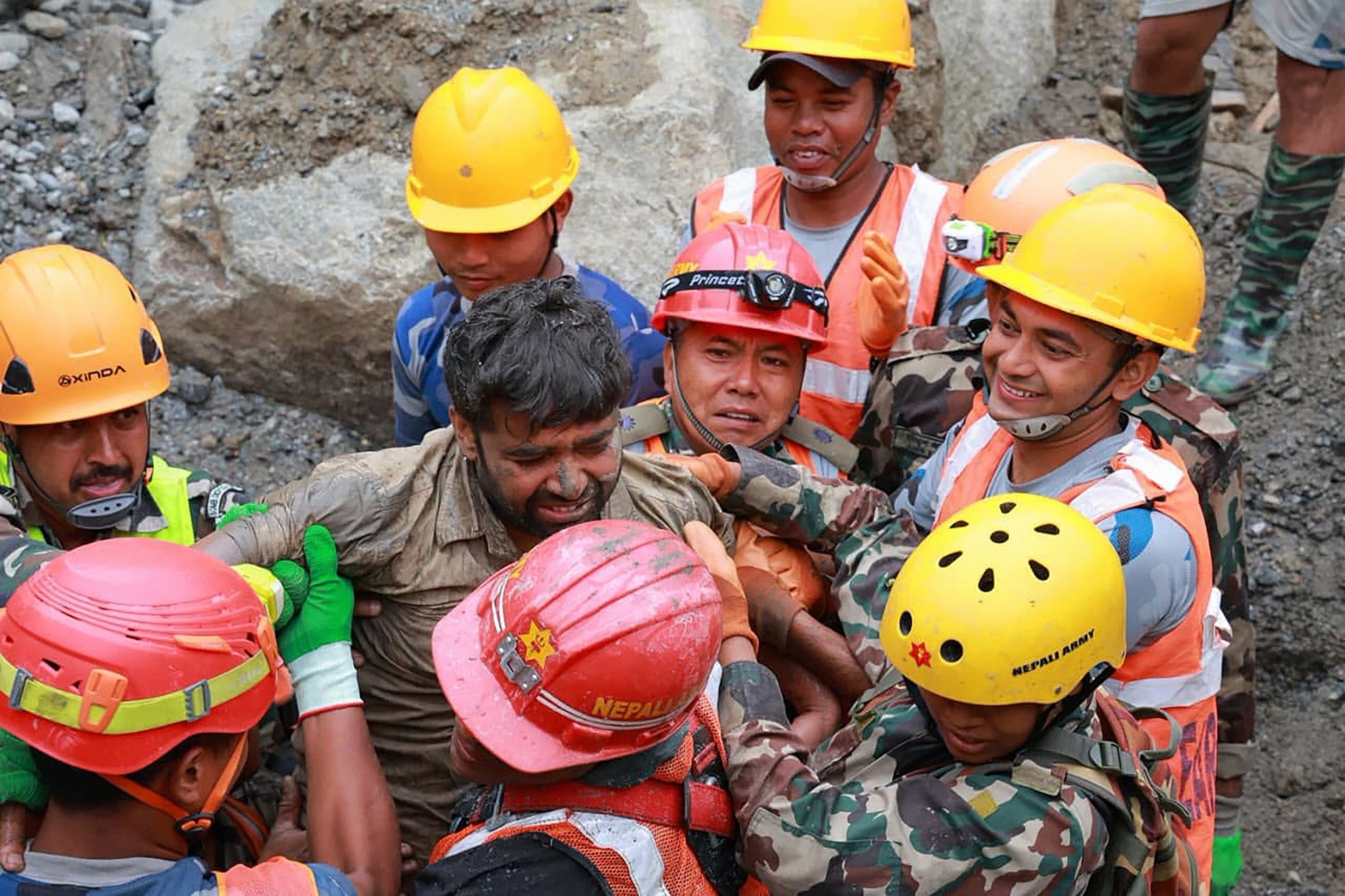 2 people rescued alive from tunnel after deadly Nepal-Tibet flash flood