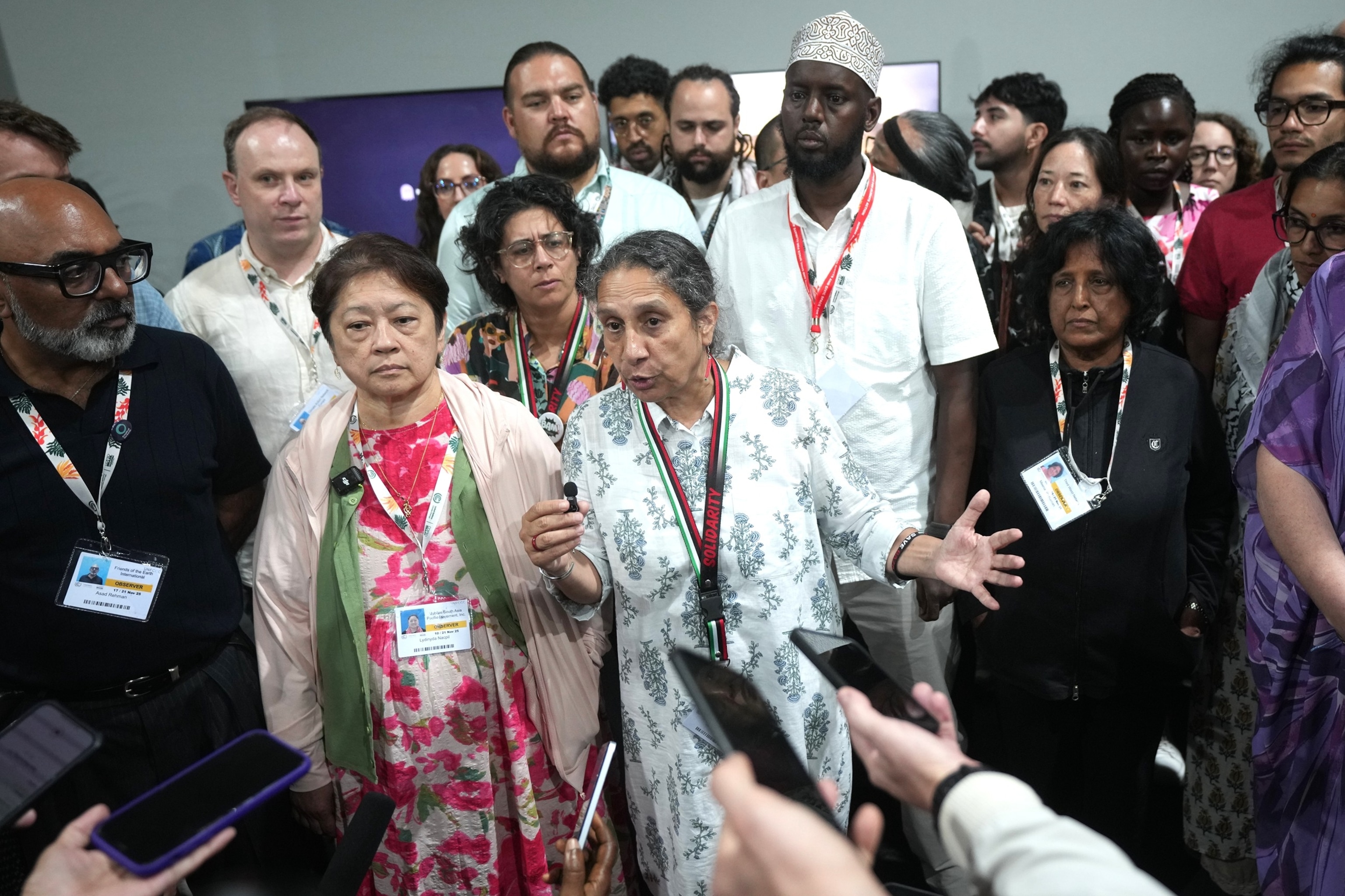 PHOTO: Tasneem Essop, executive director of the Climate Action, speaks next to Lidy Nacpil, Asian Peoples' Movement on Debt and Development, and others, during the COP30 U.N. Climate Summit, Nov. 21, 2025, in Belem, Brazil.