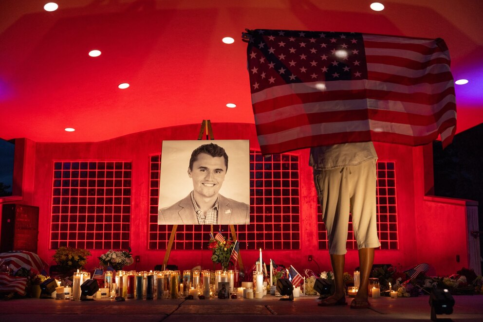 PHOTO: People pay their respects during a candlelight vigil for youth activist and influencer Charlie Kirk at a makeshift memorial at Orem City Center Park in Orem, Utah, September 11, 2025.