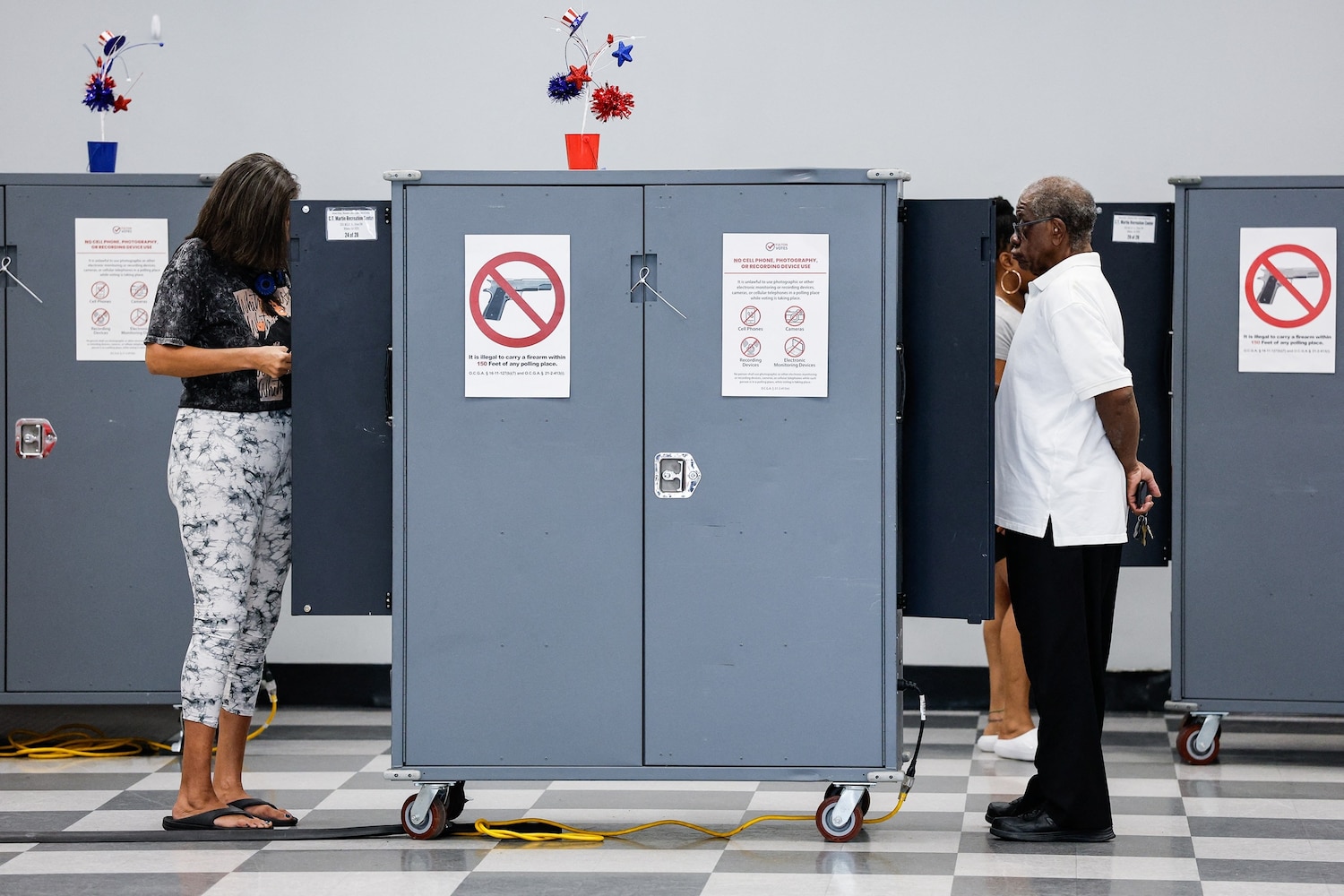 People vote at a polling location during early voting in the midterm election, in Atlanta, Georgia, October 13, 2026. Erik S. Lesser/AFP via Getty Images