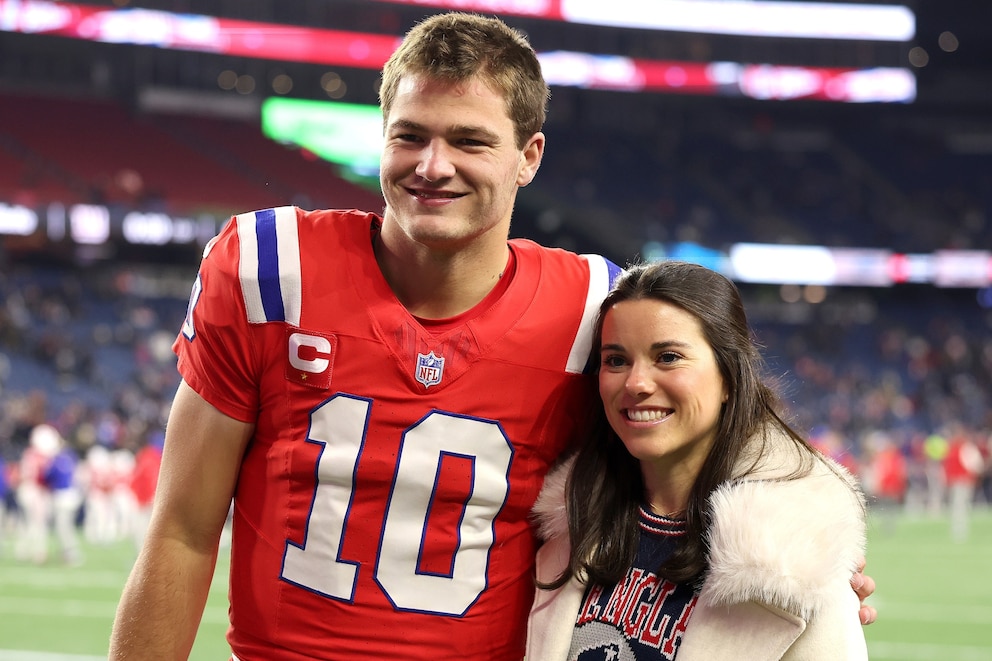 PHOTO: Drake Maye of the New England Patriots and his wife Ann Michael Maye  pose for a photo prior to the game against the New York Giants at Gillette Stadium, Dec. 1, 2025, in Foxborough, Mass.
