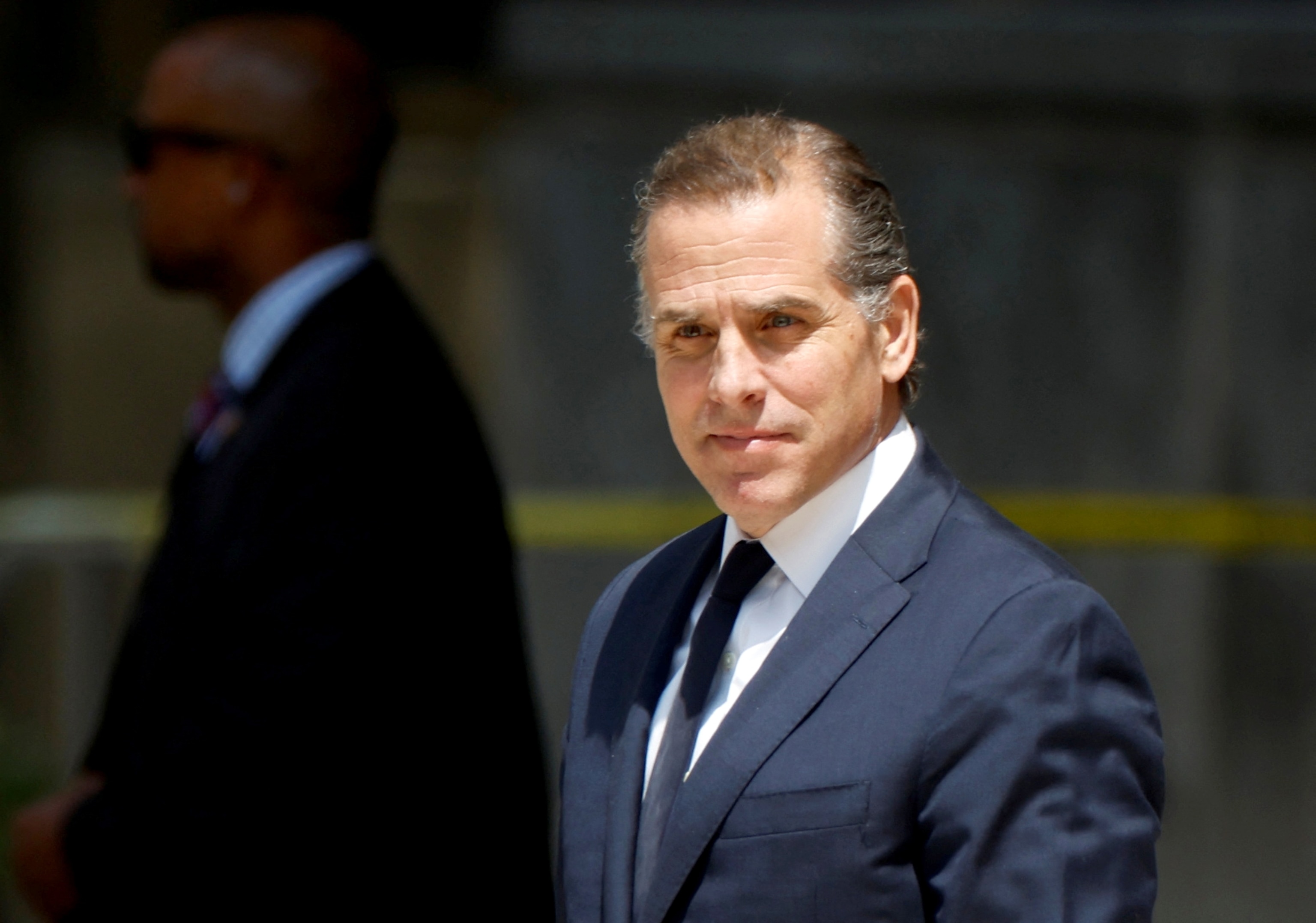 PHOTO: Hunter Biden departs federal court after a plea hearing on two misdemeanor charges of willfully failing to pay income taxes in Wilmington, Delaware, July 26, 2023.