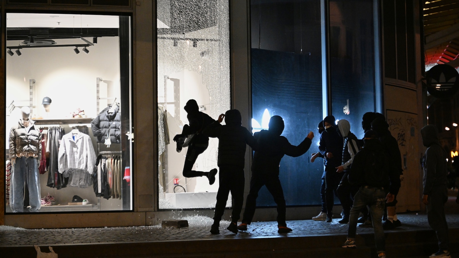 Macron rejects minister’s resignation as rioting and looting expose policing failures