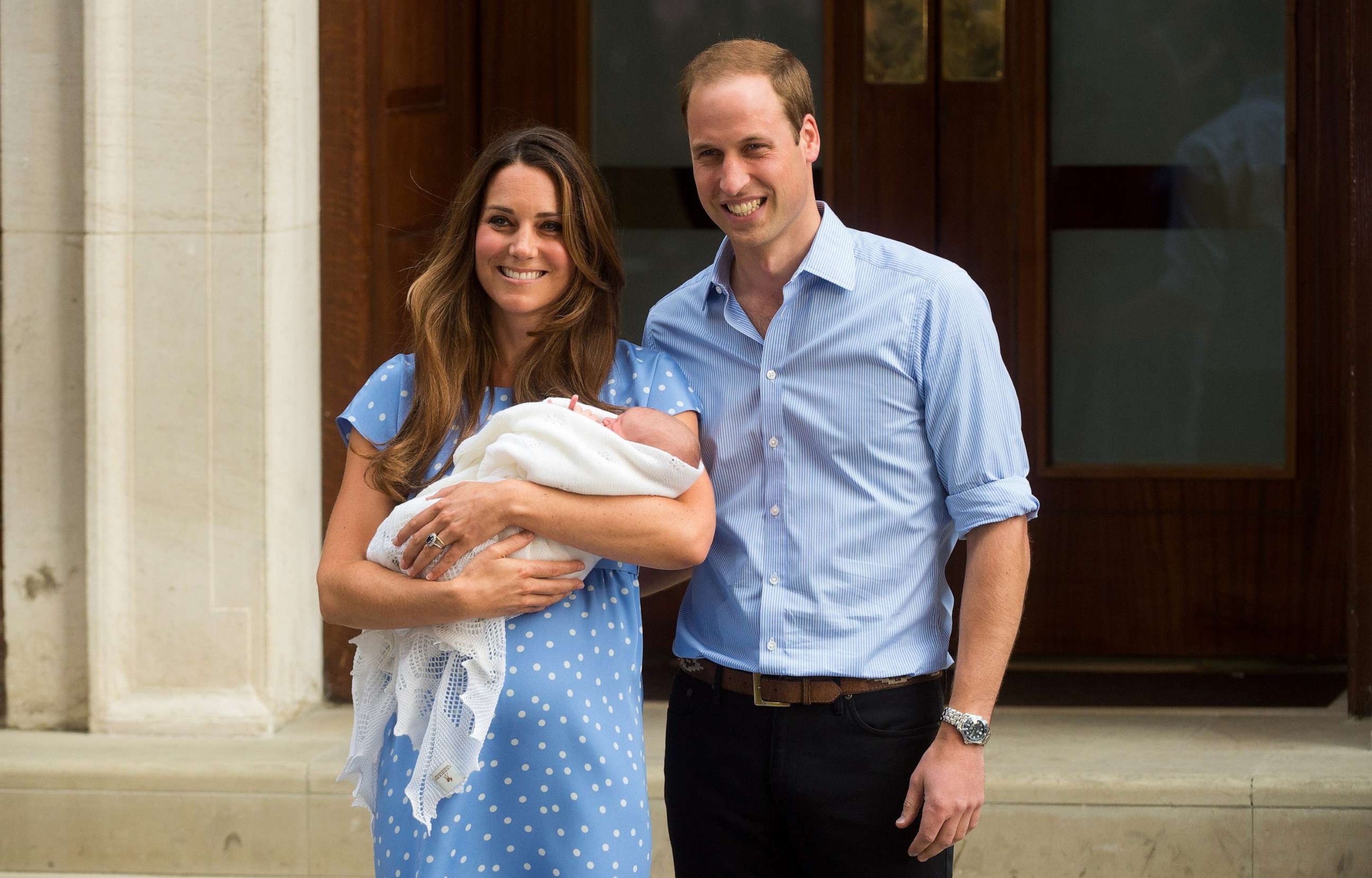 PHOTO: In this July 23, 2013, file photo, Catherine, Duchess of Cambridge and Prince William, Duke of Cambridge stand with their newborn son at St Mary's Hospital in London.