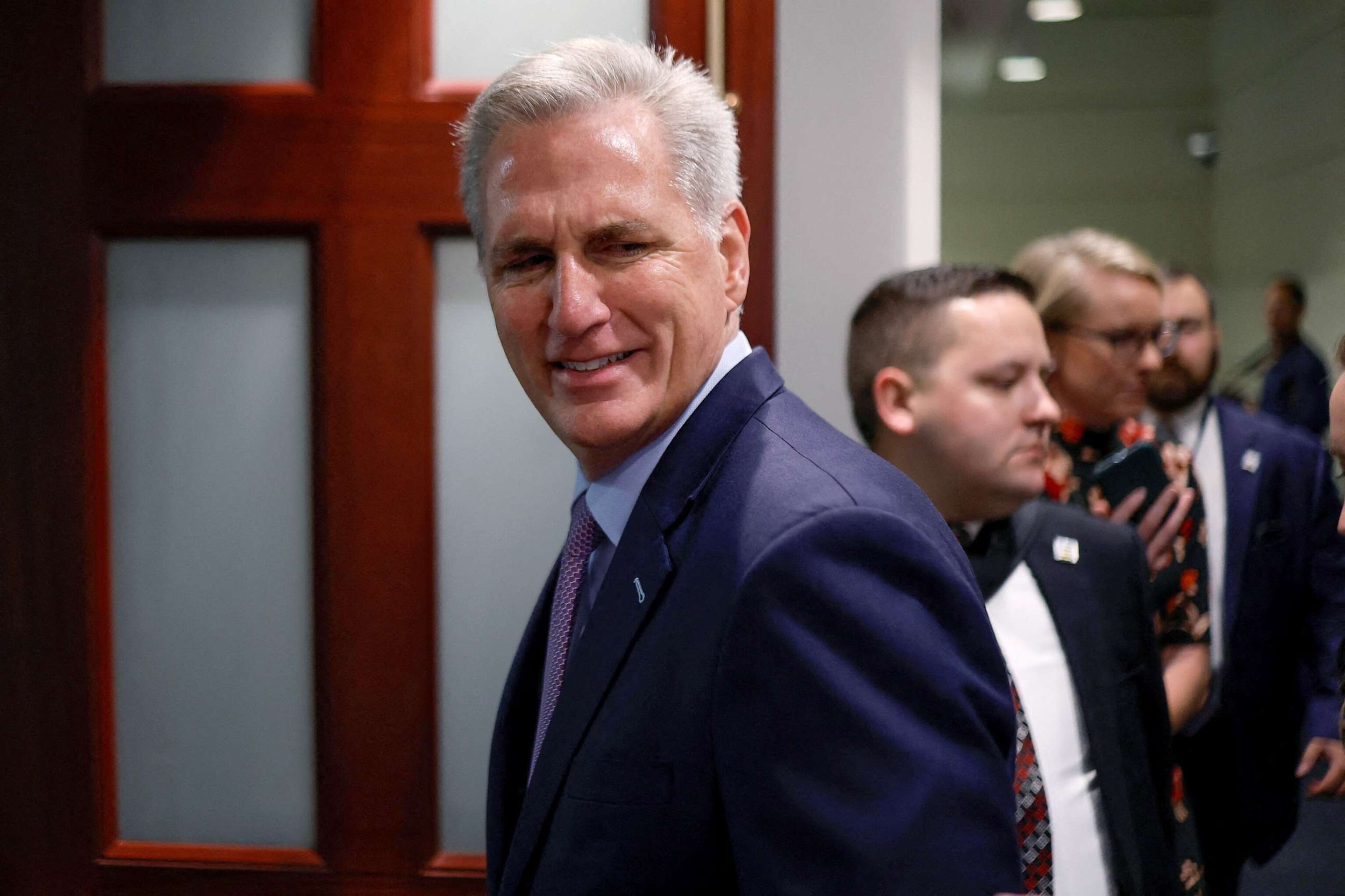 PHOTO: House Speaker Kevin McCarthy reacts to a reporter's question as he arrives for a meeting where they are expected to discuss an attempt by Rep. Matt Gaetz to oust him from the speakership, at the U.S. Capitol, Oct. 3, 2023, in Washington.