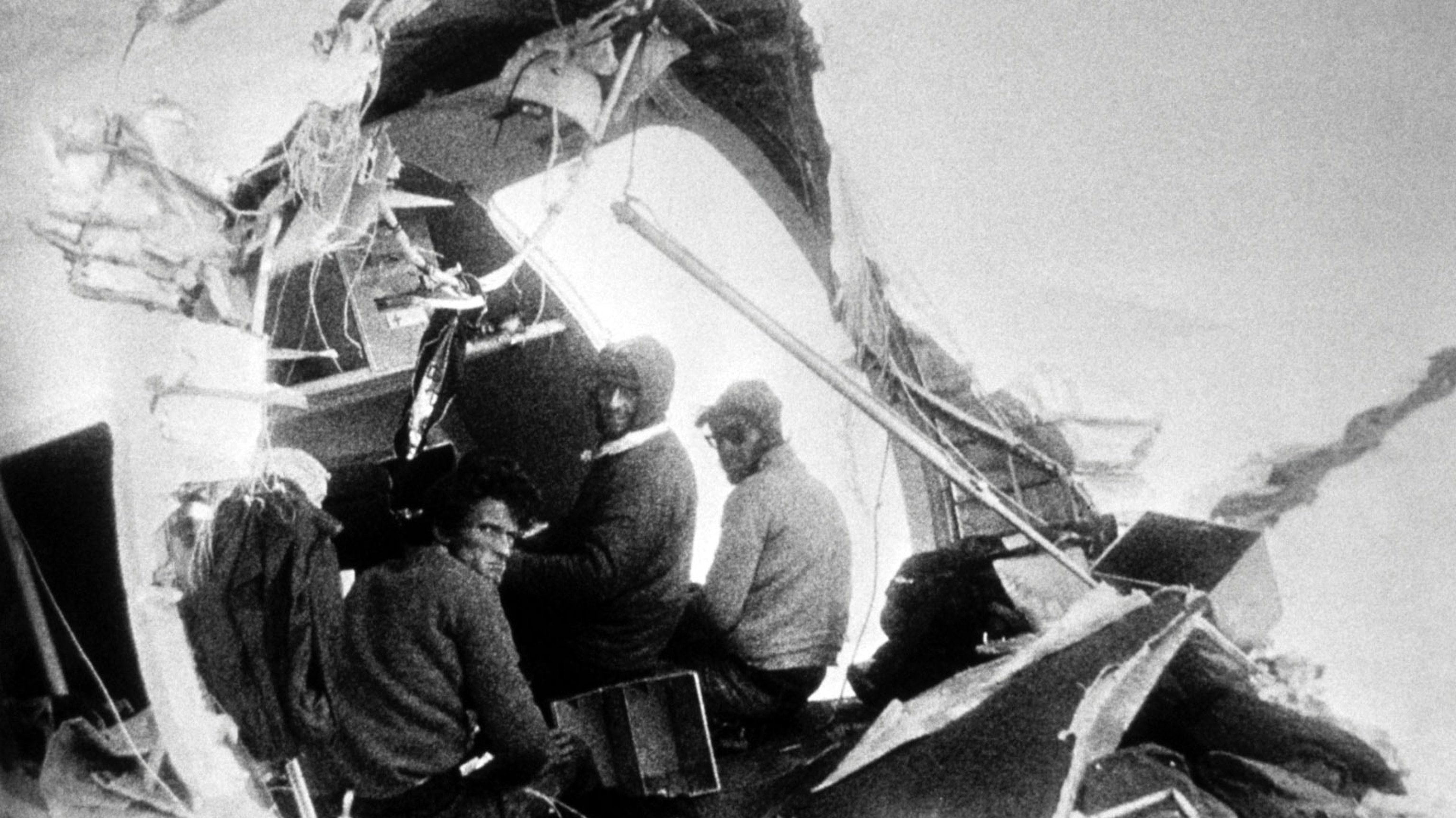 PHOTO: Roy Harley, Nando Parrado and Roberto Canessa at the aircraft's sheared off tail.