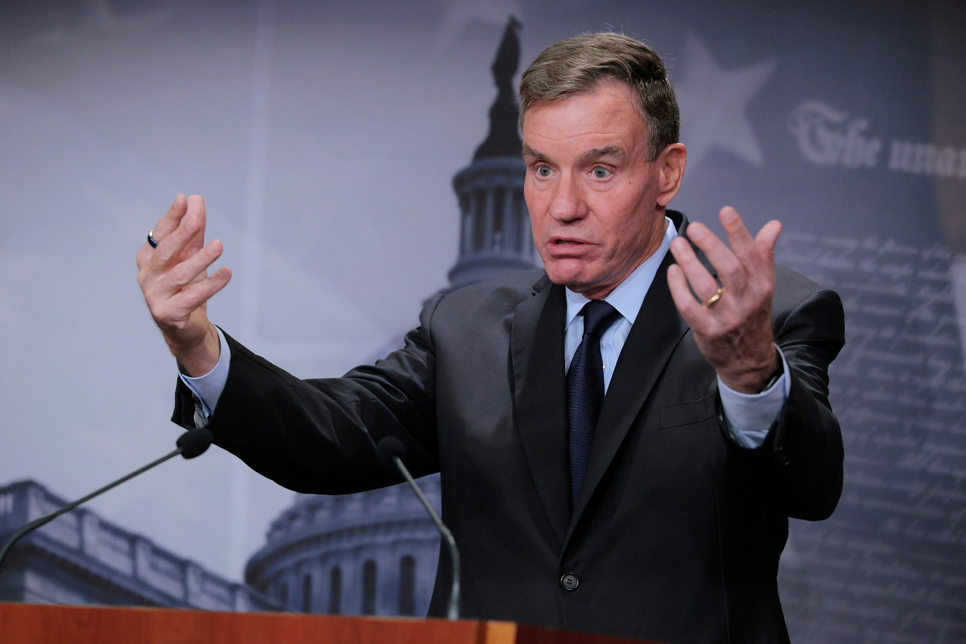 PHOTO: Senate Select Committee on Intelligence Vice Chairman Mark Warner talks to reporters about Democrats being excluded from briefings about military strikes on alleged drug boats at the Capitol, Oct. 30, 2025.