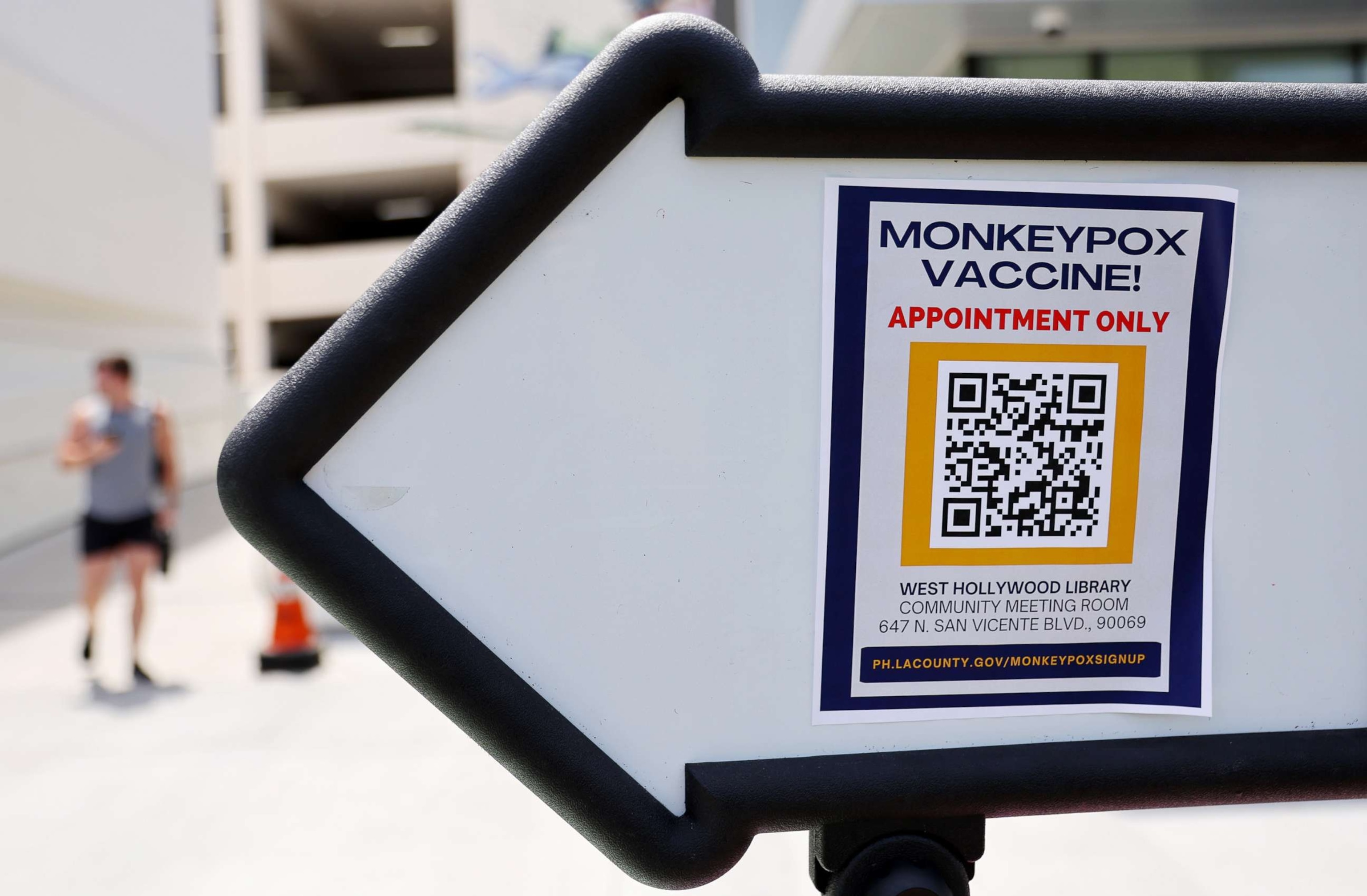 PHOTO: A sign directs people toward a pop-up monkeypox vaccination clinic which opened today by the Los Angeles County Department of Public Health at the West Hollywood Library on Aug. 3, 2022 in West Hollywood, Calif.