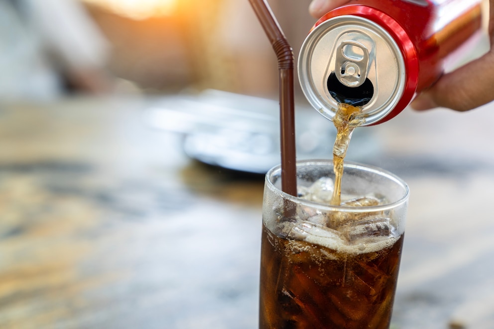 PHOTO: A person fills a glass with soda in an undated stock photo. 
