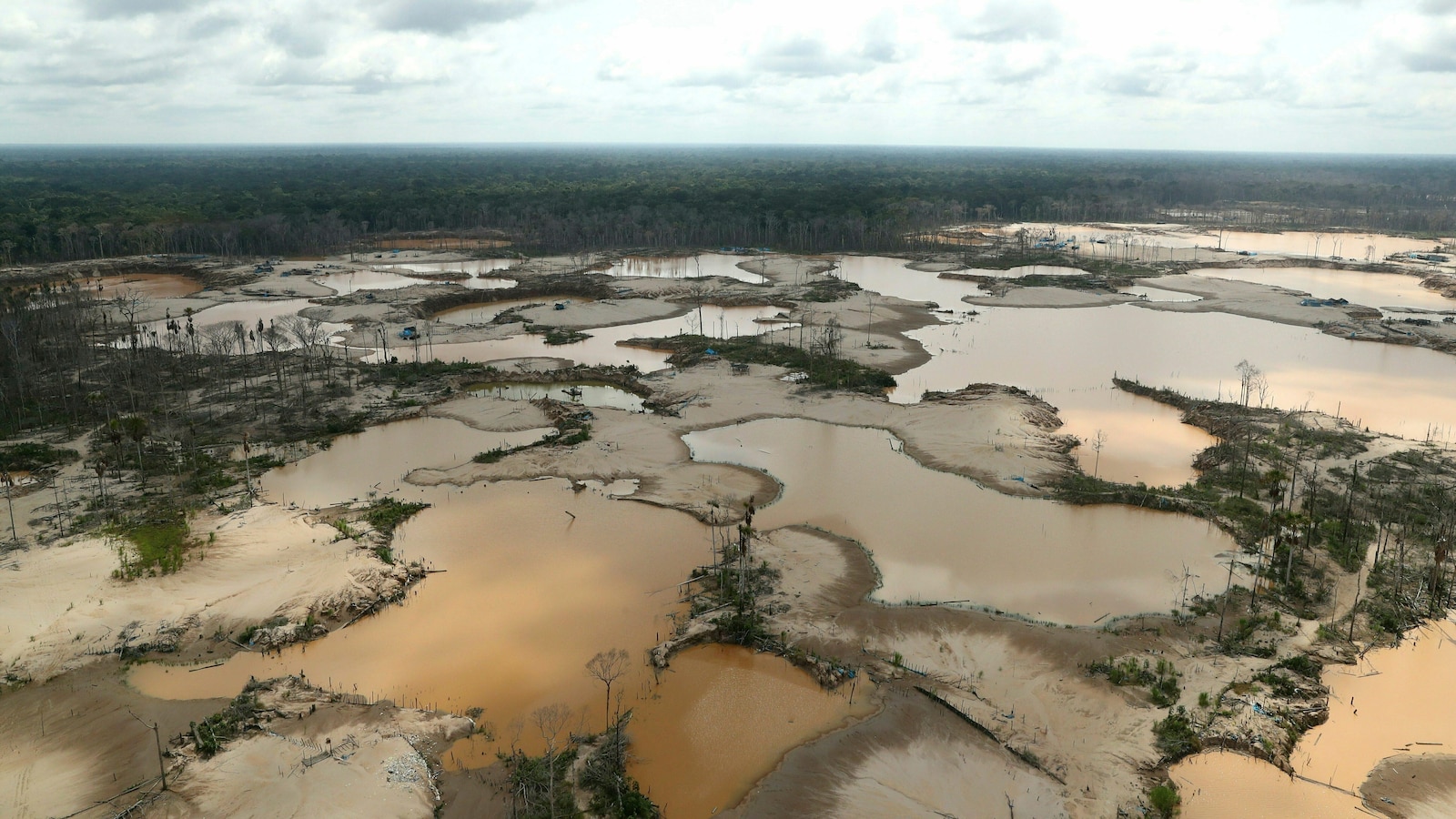 Illegal gold mining surges into new parts of Peru’s Amazon, threatening rivers and lives