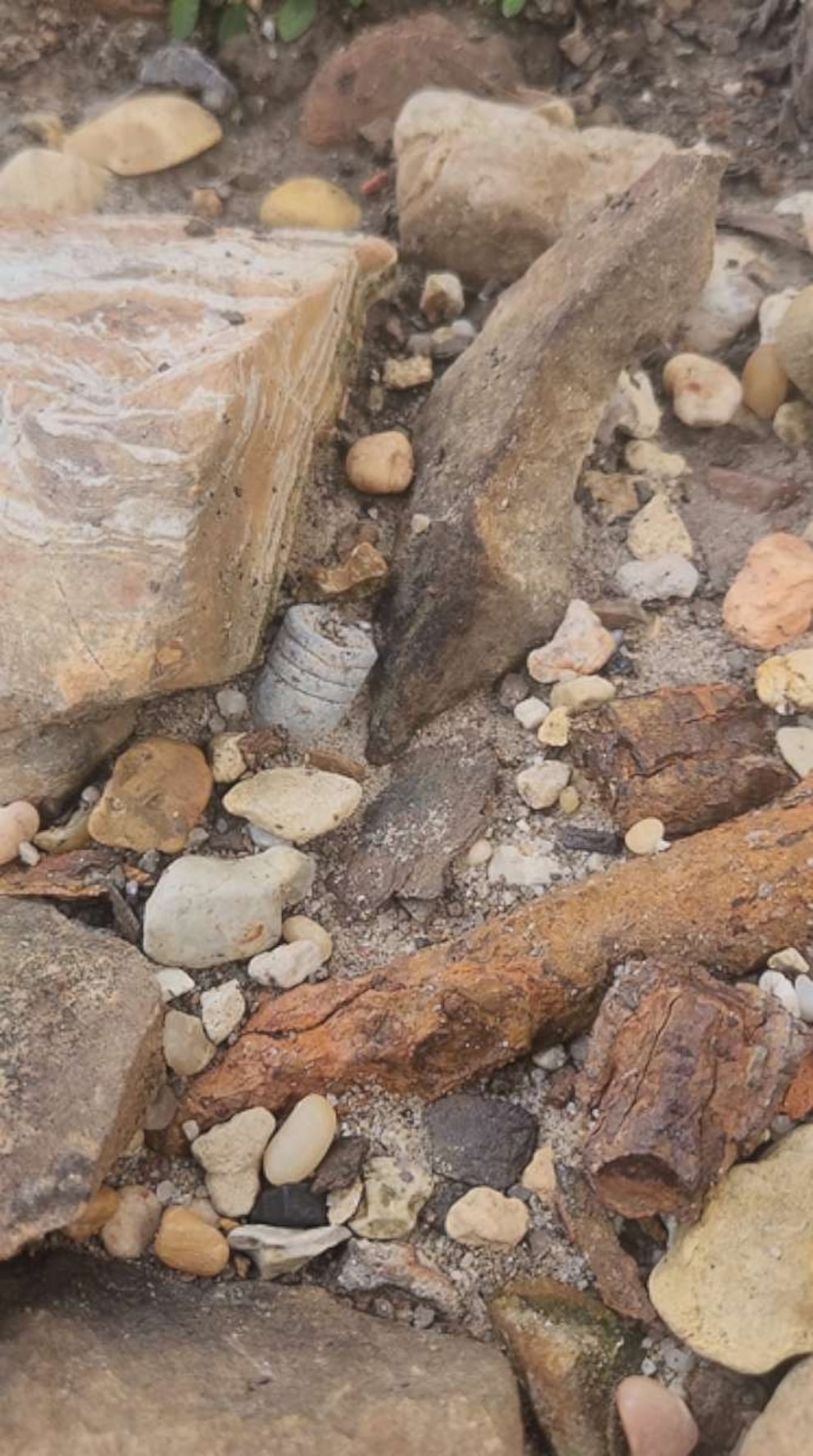 PHOTO: A Civil War .58 caliber three ring minie ball laying on the shore of the Mississippi river at Memphis