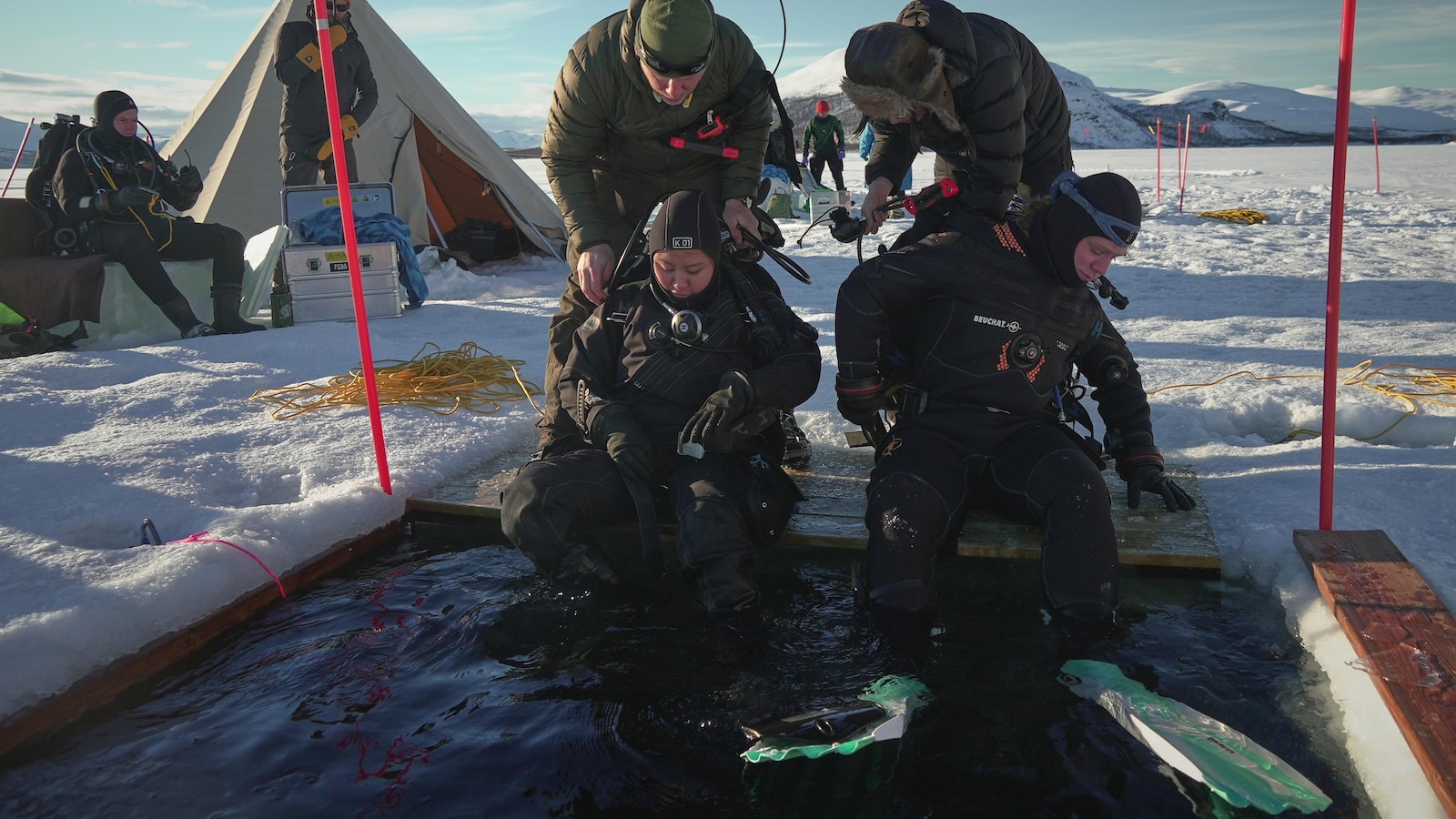 Scientists train to dive beneath polar ice as climate change warms the Arctic and Antarctica
