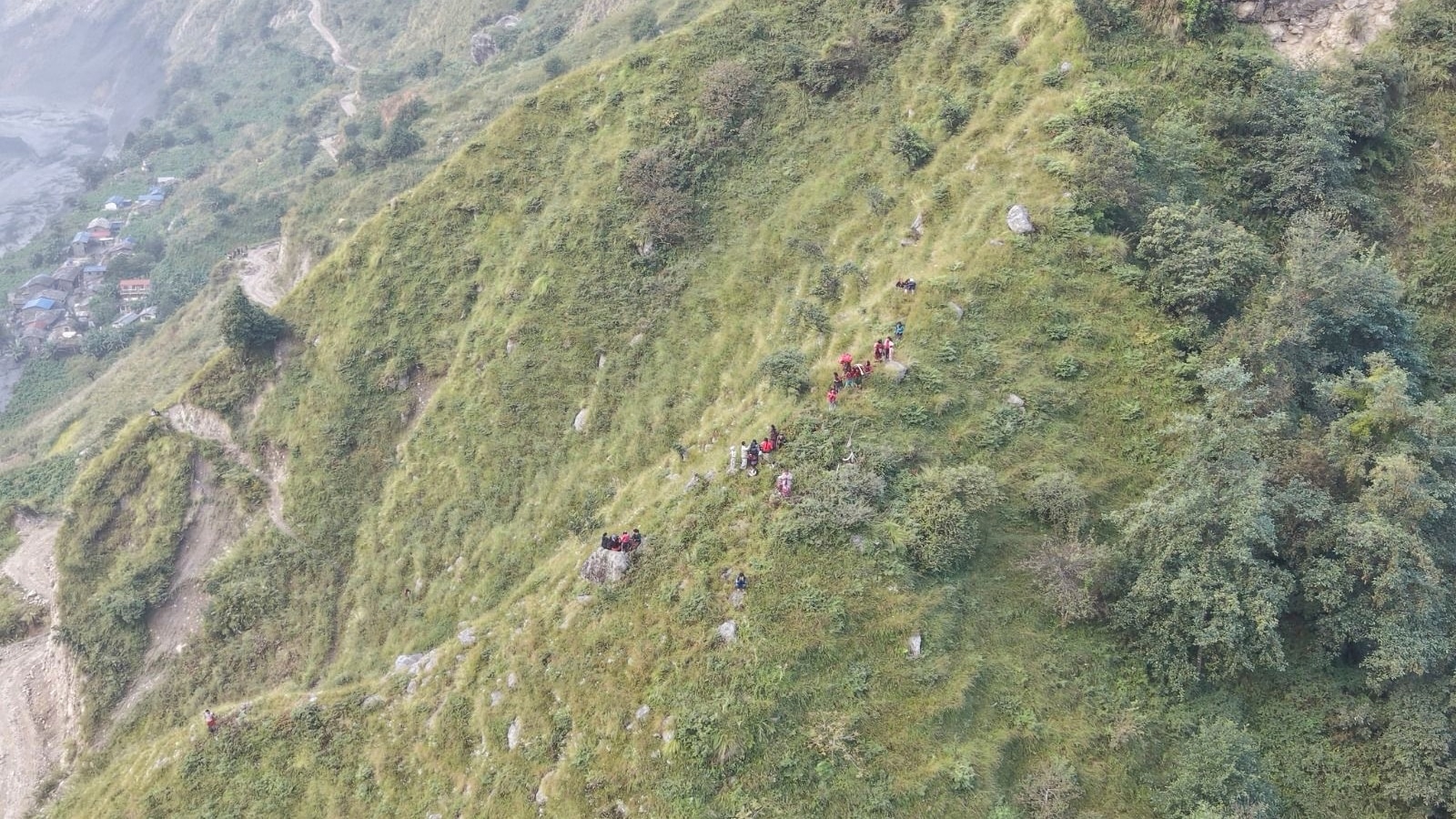 Rescue helicopters race to flood-hit Nepal villages as 5 reported missing