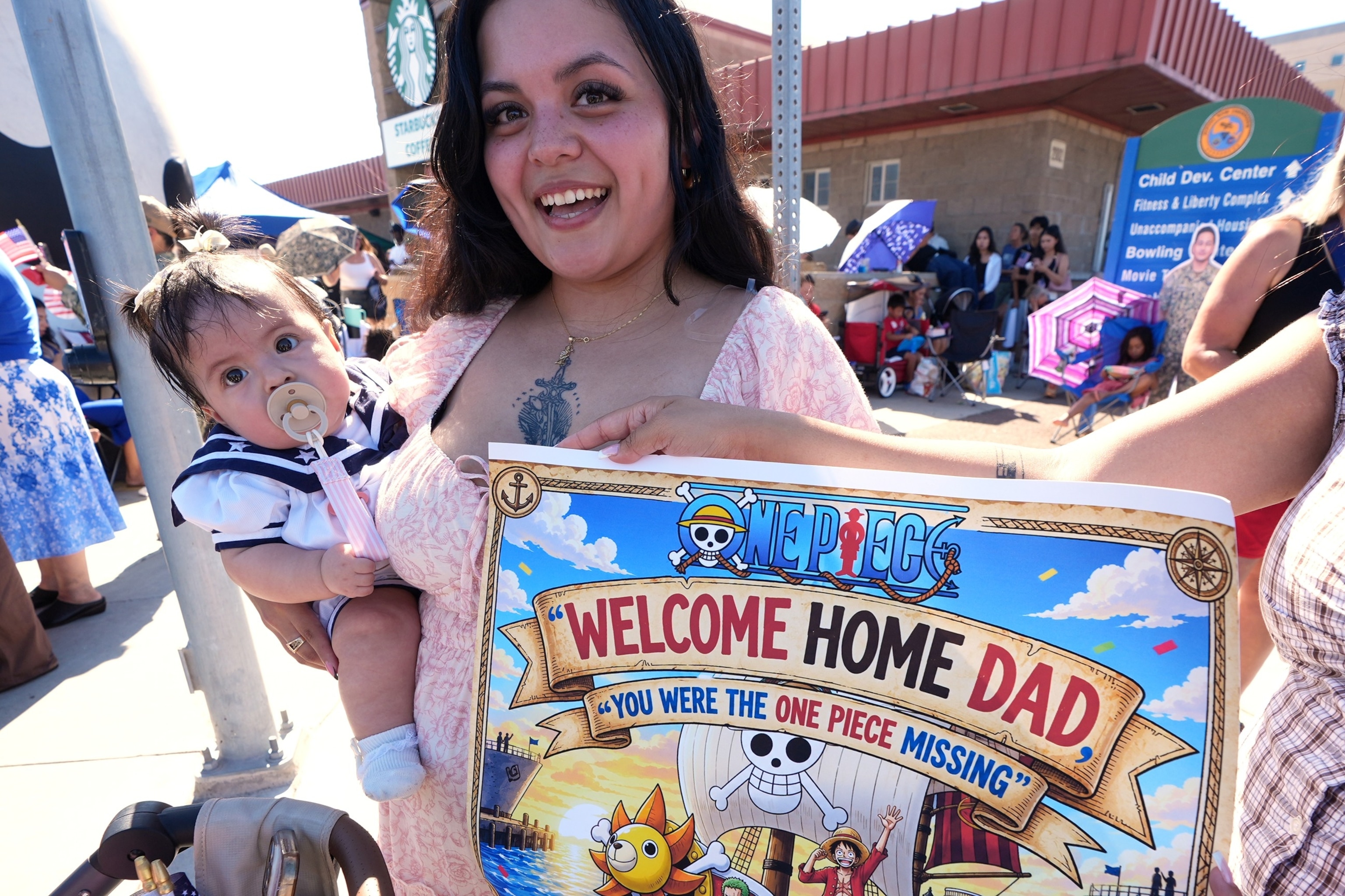 PHOTO: Kathy Monterroso holds her daughter Sarahi Monterroso as she waits to greet her husband, sailor Chris Monterroso as the USS Abraham Lincoln aircraft carrier returns to Naval Air Station North Island, Oct. 8, 2026, in Coronado, Calif.