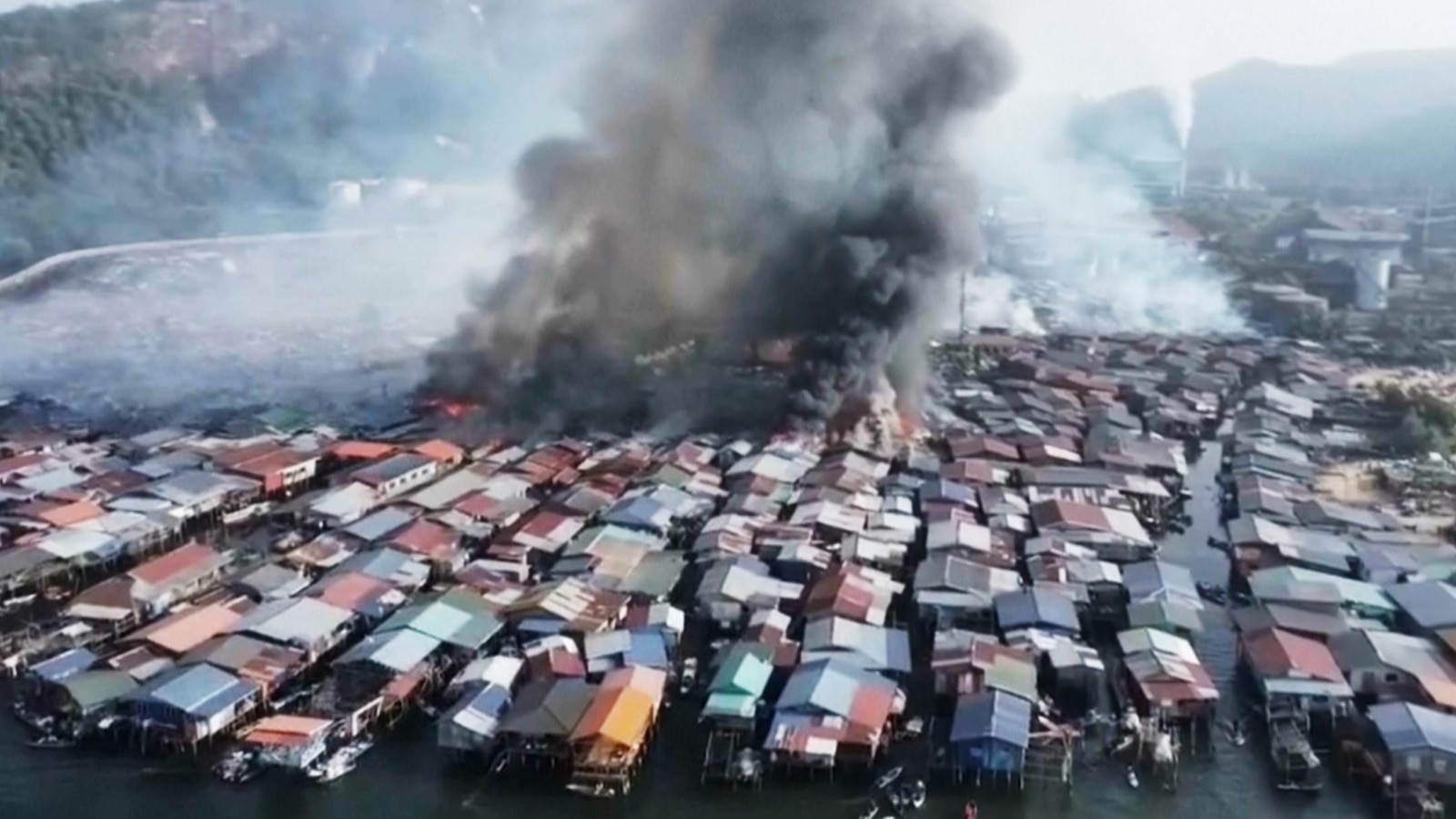Fire destroys 1,000 homes in a Malaysian coastal village on Borneo Island