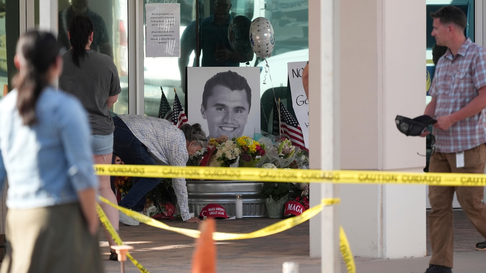 The Latest: Shooter eludes capture after assassinating conservative activist Charlie Kirk