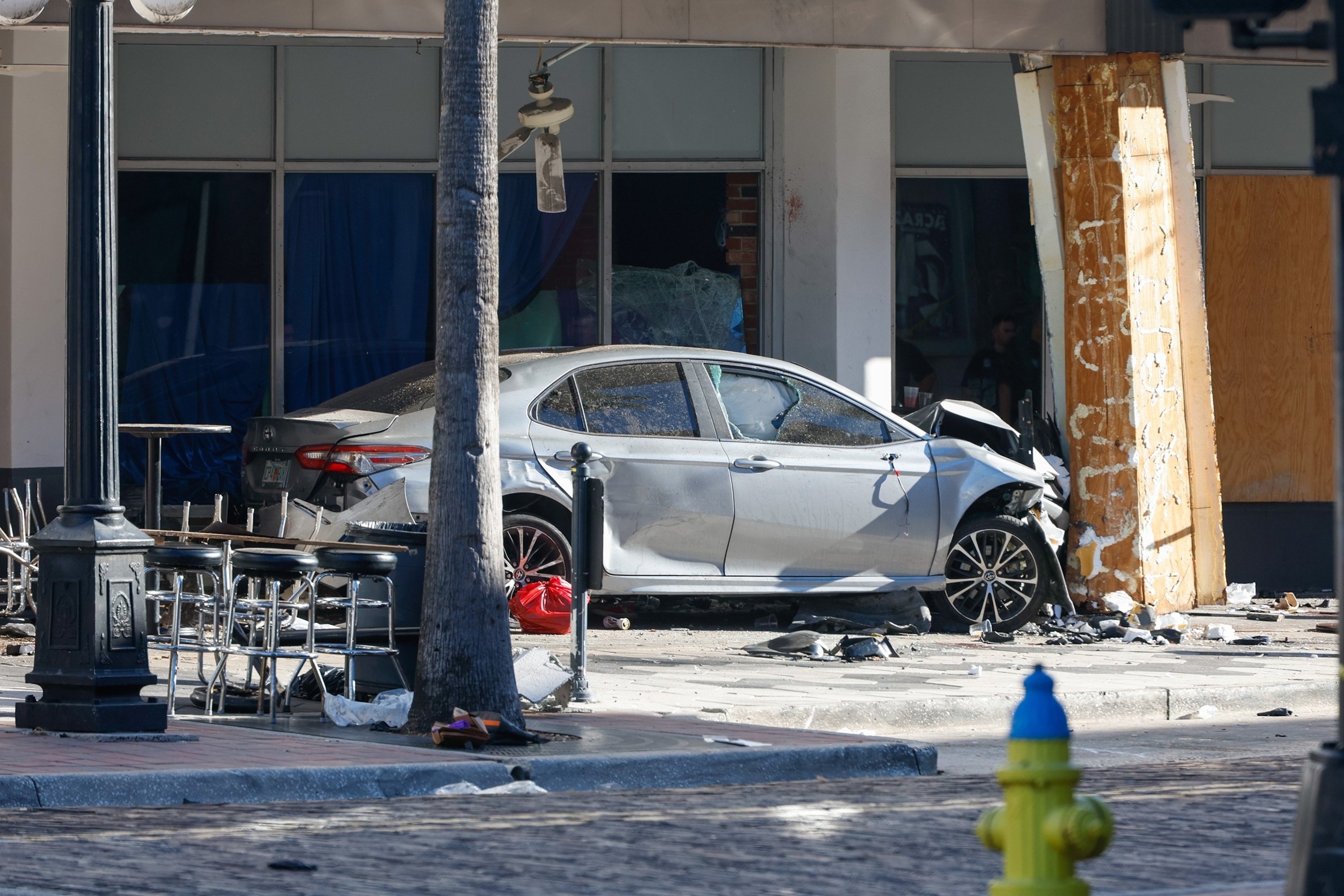 4 dead, 11 injured after speeding car crashes into business, pedestrians