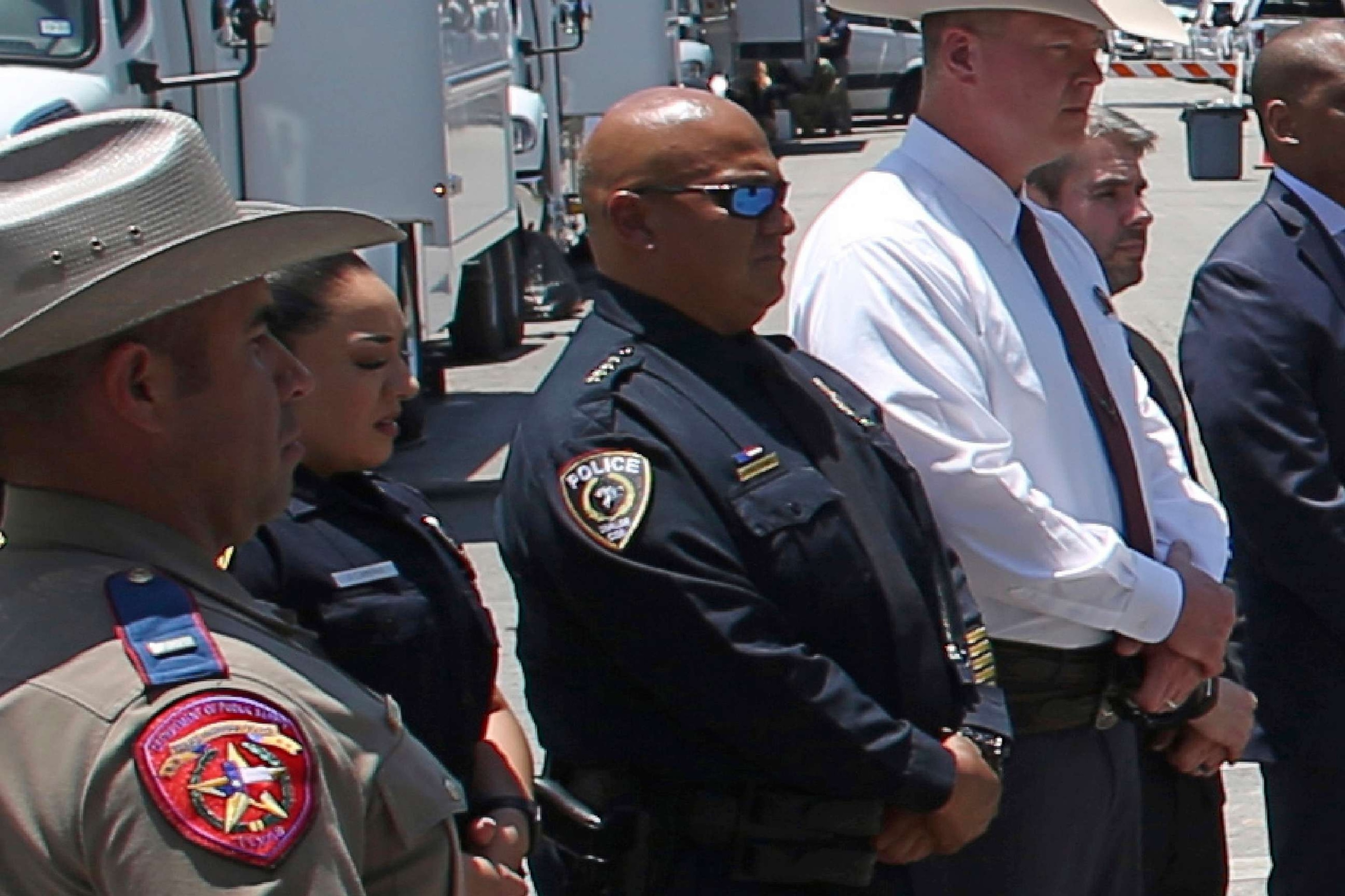 PHOTO: Uvalde School Police Chief Pete Arredondo, third from left, stands during a news conference outside of the Robb Elementary School, May 26, 2022, in Uvalde, Texas.