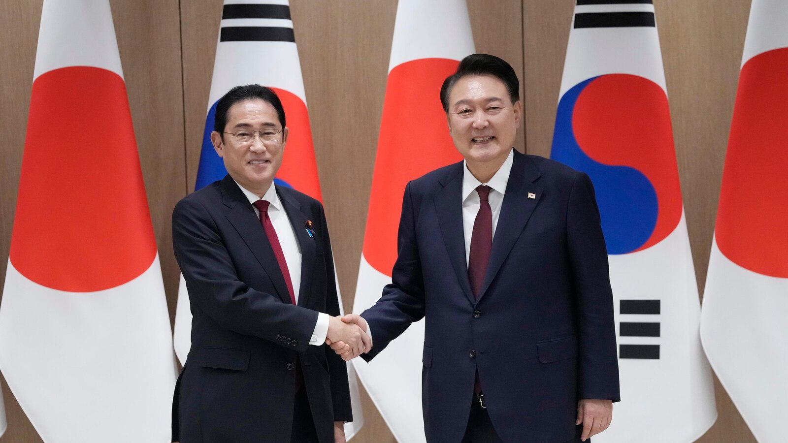 Japan’s leader makes farewell visit to South Korea to strengthen his legacy of warming ties