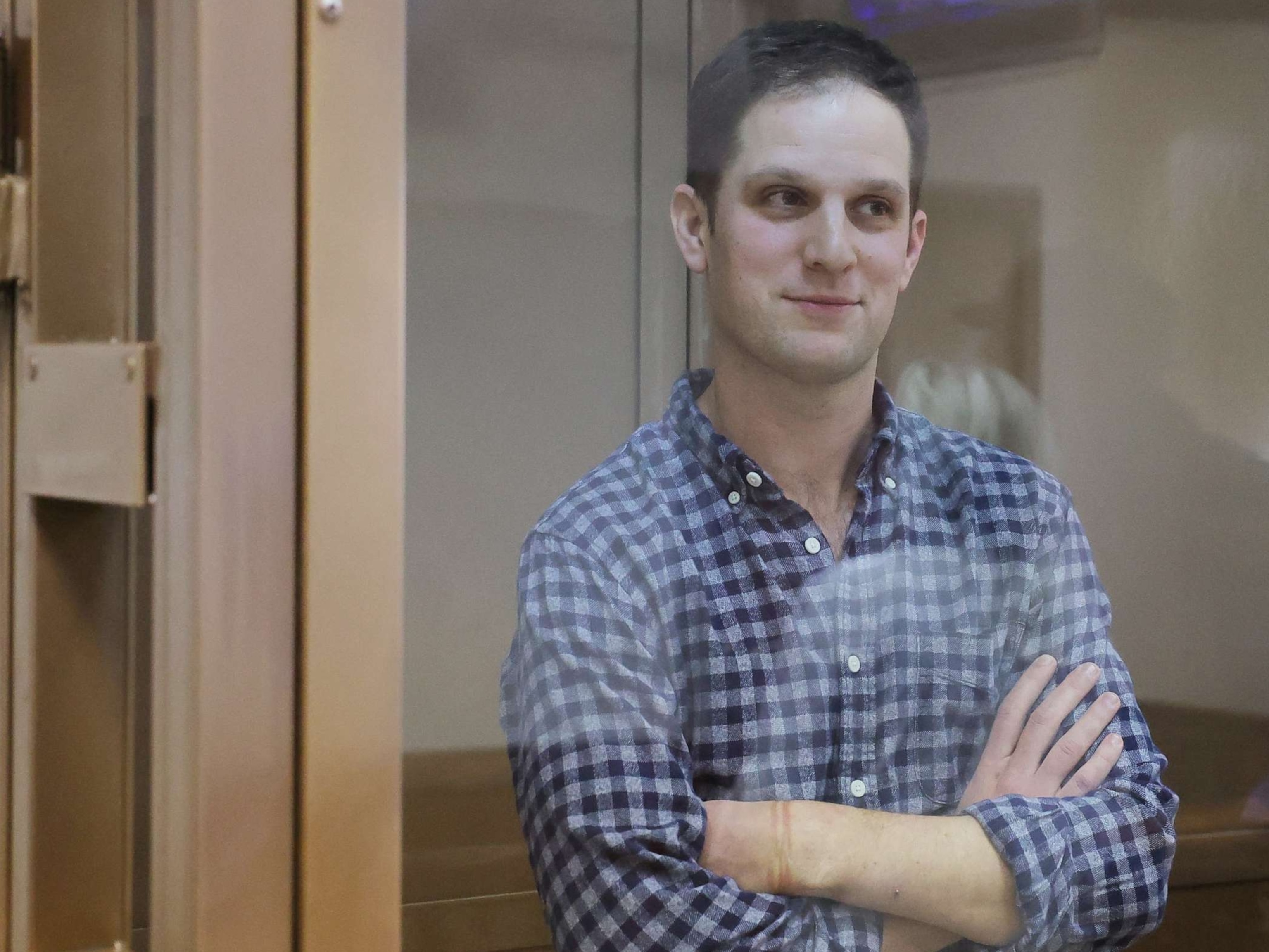 PHOTO: Wall Street Journal reporter Evan Gershkovich stands behind a glass wall before a court hearing to consider an appeal against his detention, in Moscow, Russia, April 18, 2023.