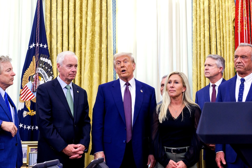 PHOTO: President Donald Trump, Rep. Marjorie Taylor Greene, Sen. Tommy Tuberville, and Robert F. Kennedy Jr., Secretary of Health and Human Services, are shown during a ceremony in the Oval Office of the White House in Washington, D.C., Feb. 13, 2025.