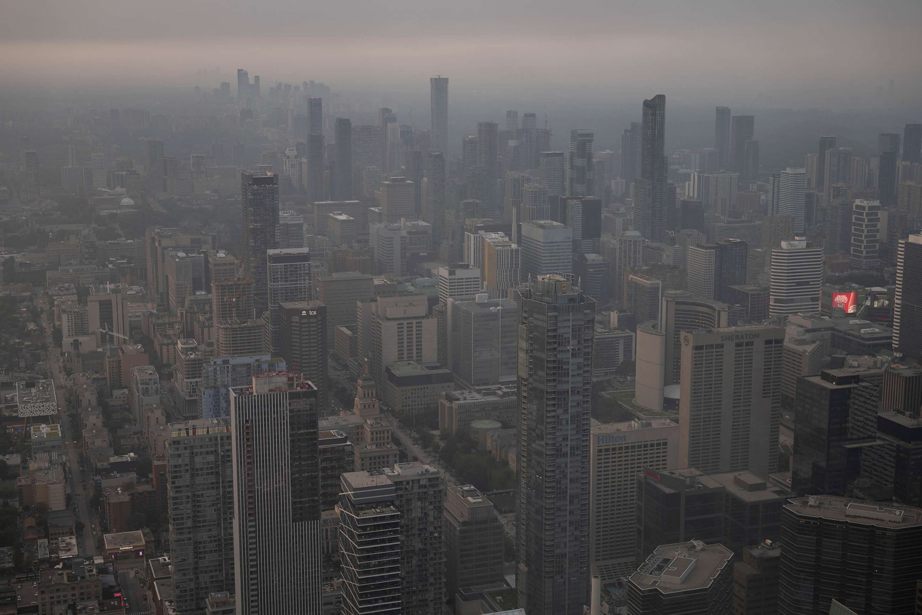 PHOTO: Smoke from wildfires in the provinces of Quebec and Nova Scotia is seen on June 28, 2023 in Toronto.