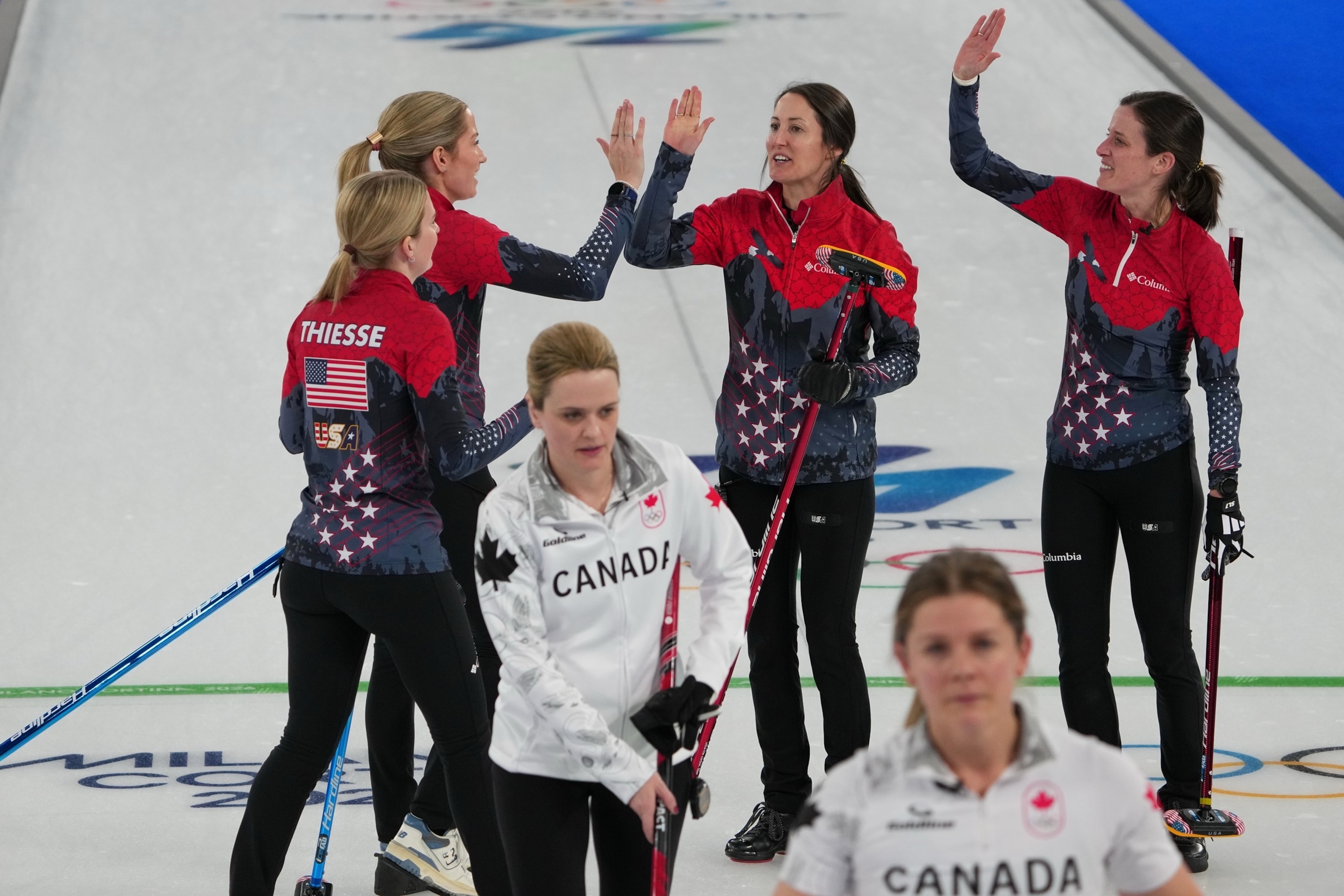 PHOTO: USA curlers Cory Thiesse, Taylor Anderson-Heide, Tabitha Peterson, and Tara Peterson celebrate after defeating Canada at the Milano Cortina 2026 Winter Olympic Games in Cortina d'Ampezzo, Italy, Feb. 13, 2026. Feb. 15, 2026. 
