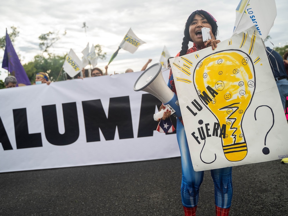 PHOTO: In this Oct. 15, 2021, file photo, protesters march during a demonstration against LUMA Energy in what organizers called All of Puerto Rico Against LUMA, in San Juan, Puerto Rico. 