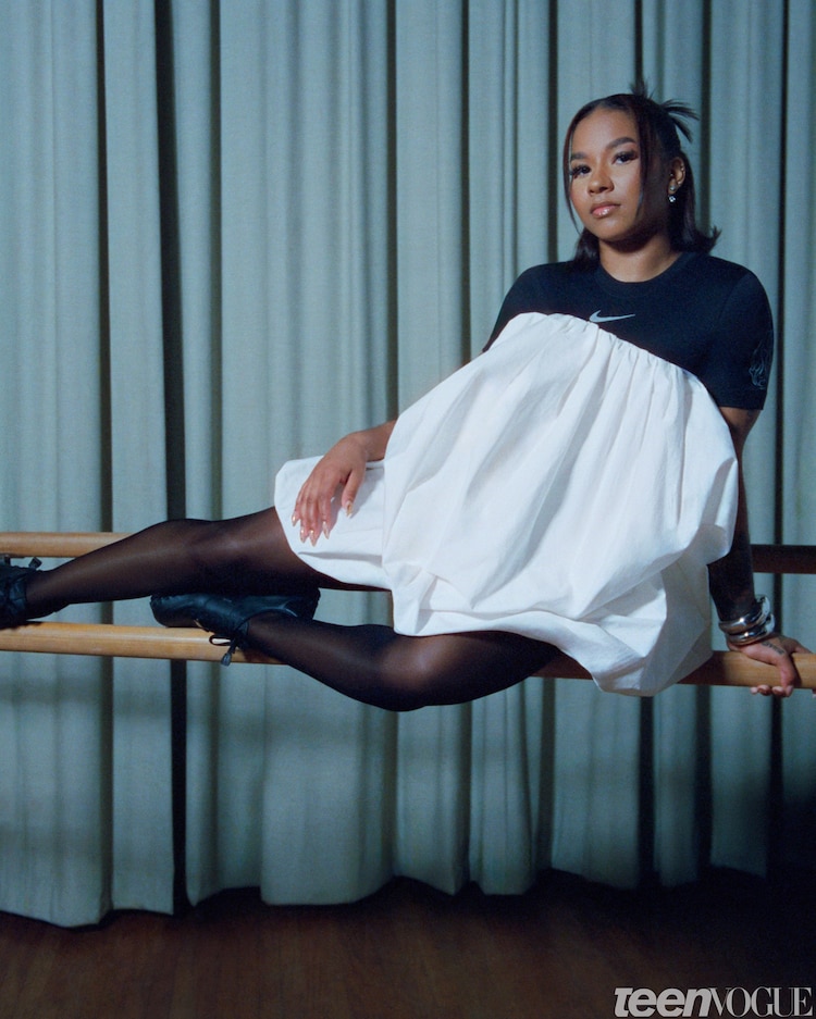 jordan chiles wore a shirt-dress and thigh-high boots Jordan Chiles Gets Ready For Simkhai's NYFW Show