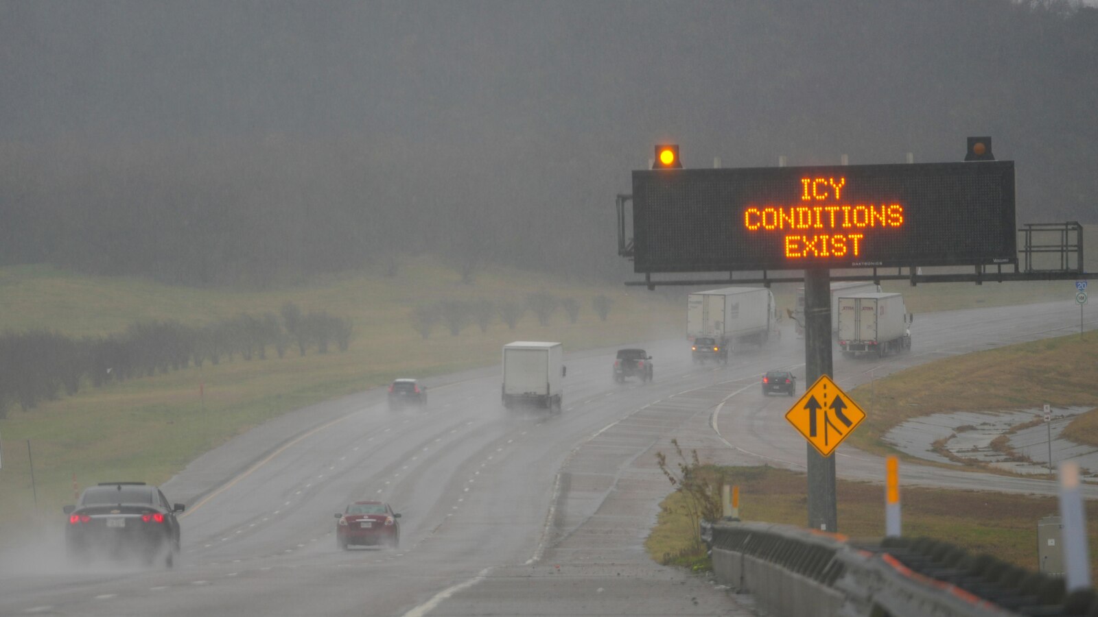 Winter storm plods into the Deep South, prompting states of emergency and school closures