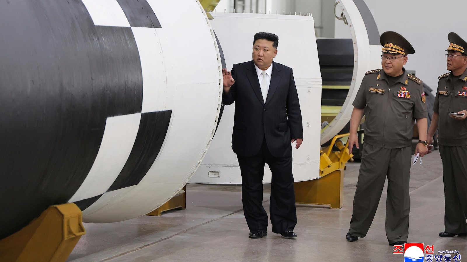 North Korea’s Kim Jong Un travels to Beijing to watch military parade