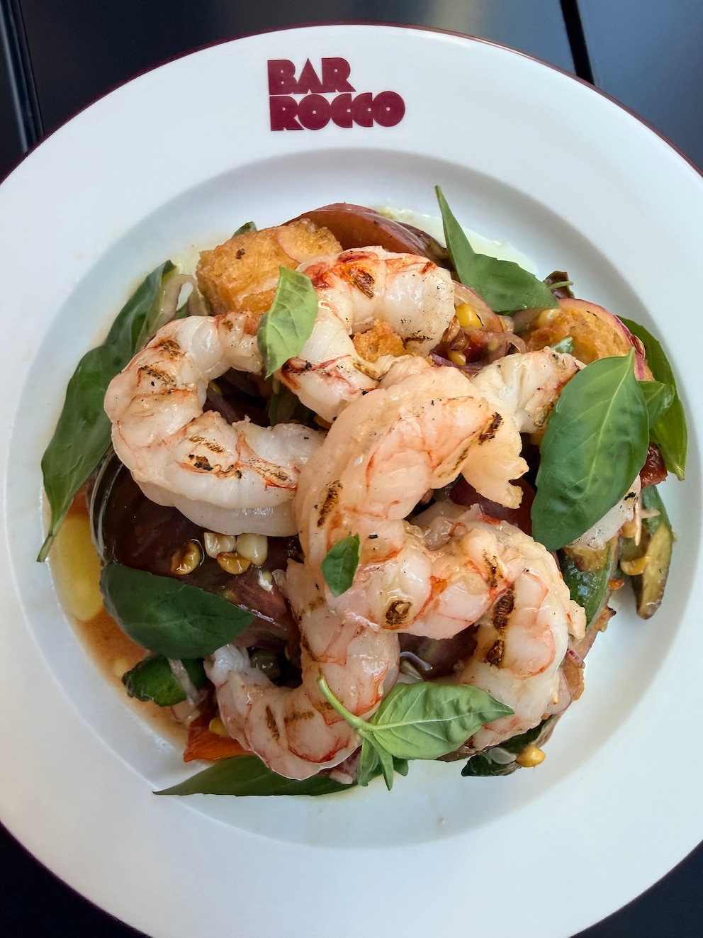 Rocco DiSpirito's summer garden panzanella with grilled shrimp is pictured here.
