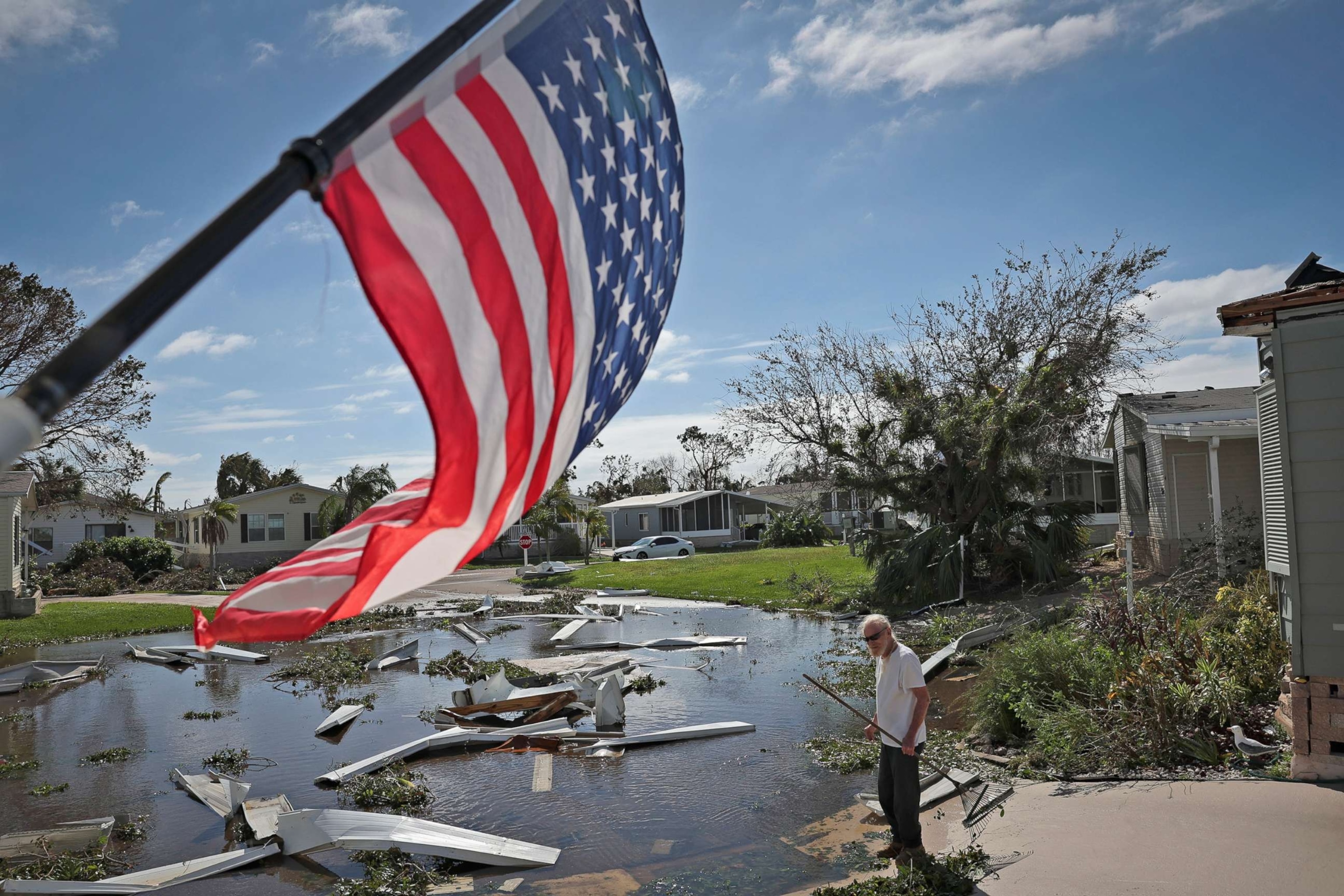 PHOTO: A man begins cleaning up after Hurricane Ian moved through the Gulf Coast of Florida on Sept. 29, 2022 in Punta Gorda, Fla.