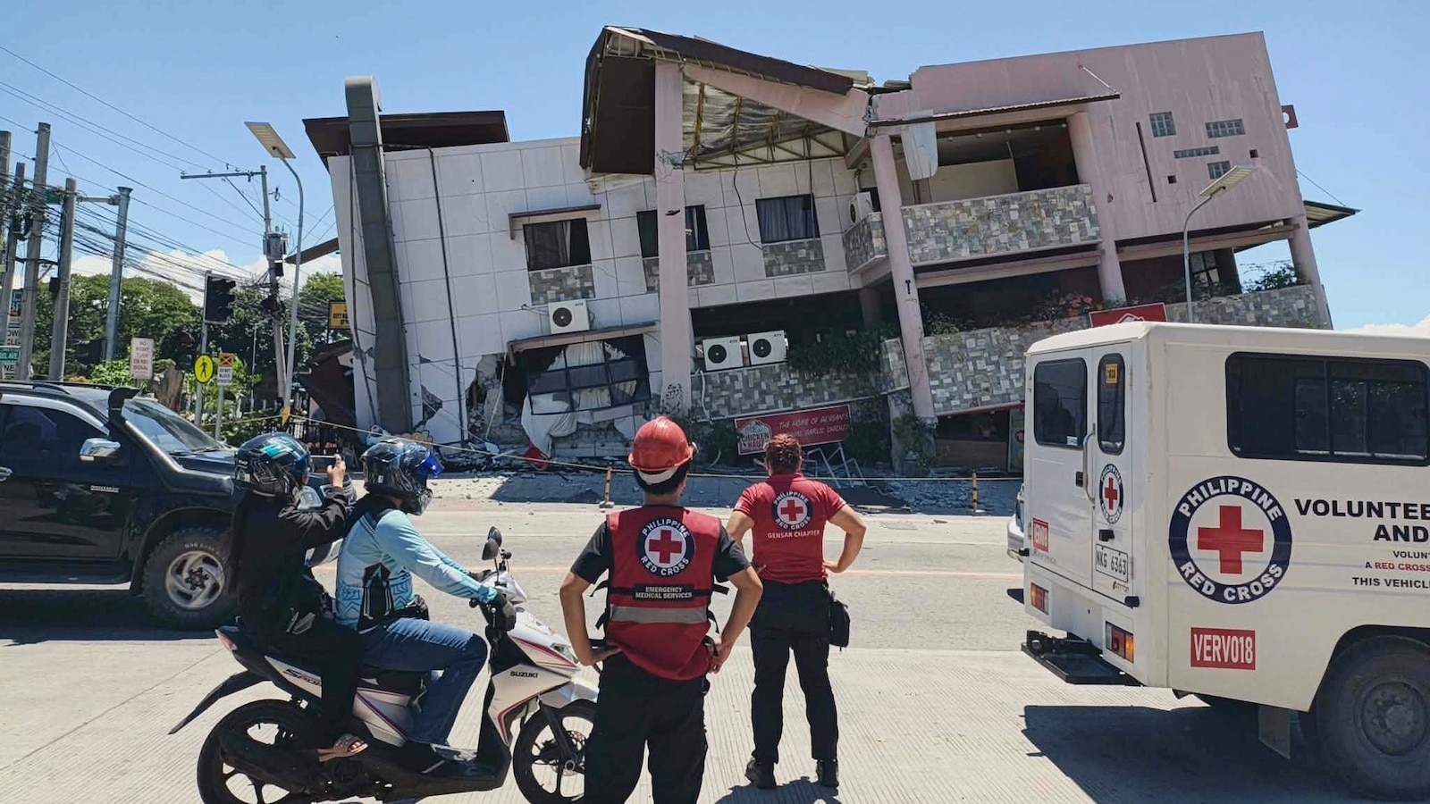 A 7.8 magnitude quake in the Philippines kills at least 19, fells buildings and sets off a tsunami
