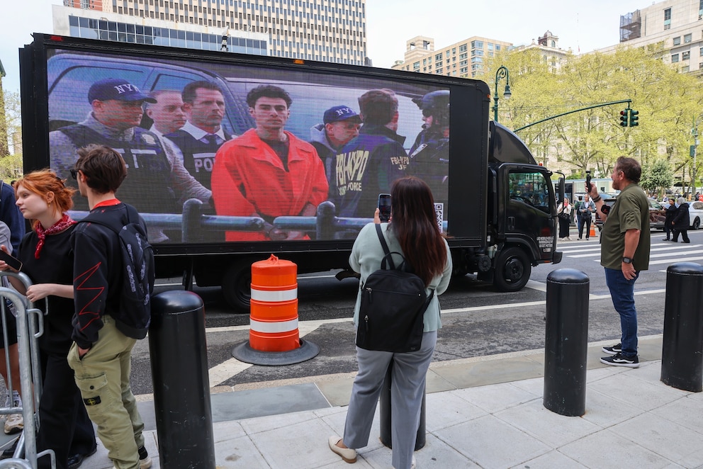 PHOTO: A truck displays pictures of Luigi Mangione as his supporters gather outside a federal court in Manhattan as the murder suspect is set to appear for the arraignment on April 25, 2025, in New York.