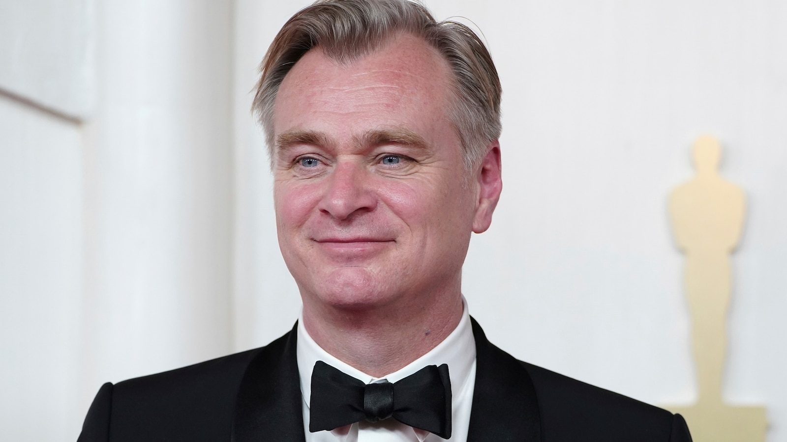 Christopher Nolan arrives at the Oscars, March 10, 2024, at the Dolby Theatre in Los Angeles. 