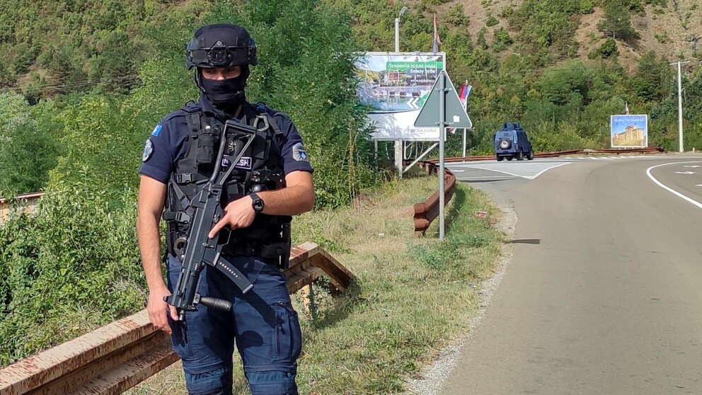 1 Kosovo police officer killed and 1 wounded in an attack in the north, raising tensions with Serbia