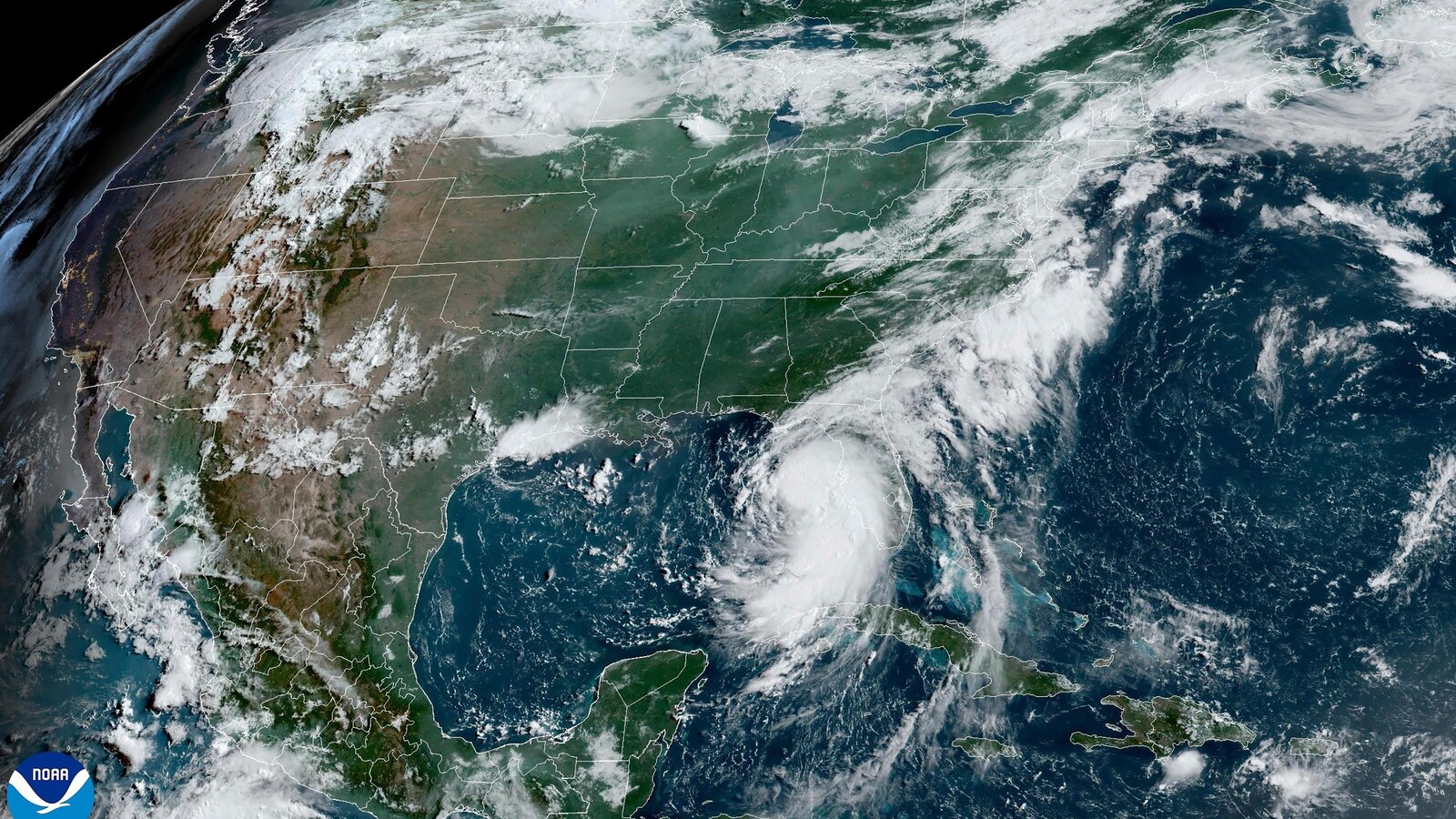  Tropical Storm Debby moves through Gulf toward Florida with hurricane warnings