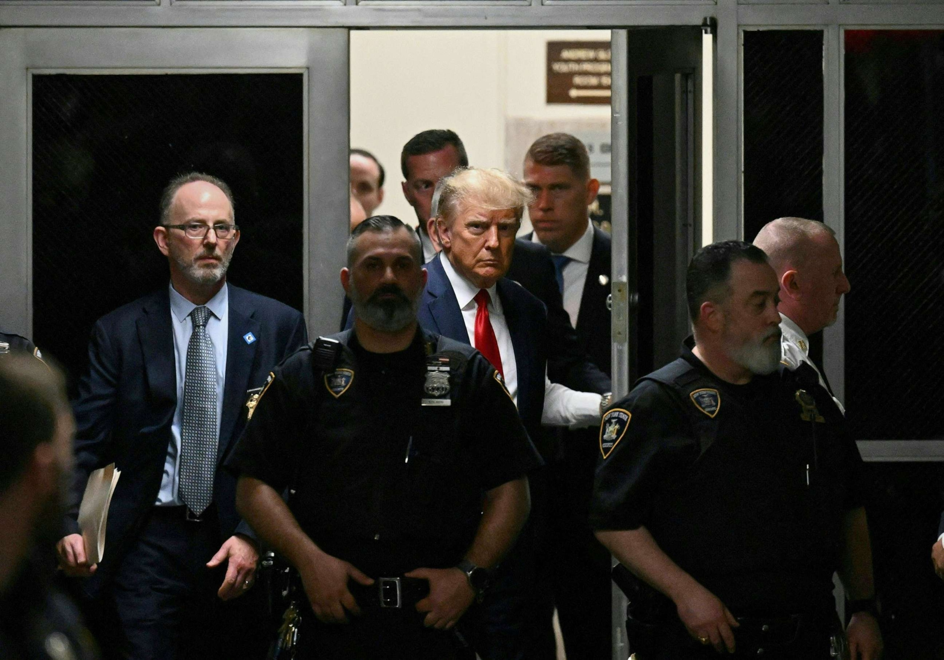 PHOTO: Former President Donald Trump makes his way inside the Manhattan Criminal Courthouse in New York to the courtroom, April 4, 2023.